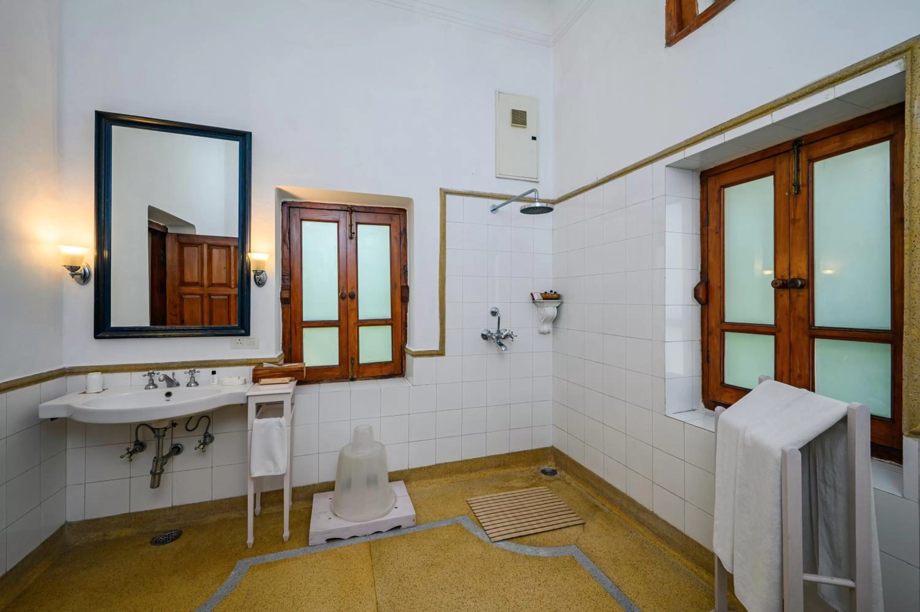 Shower, Bed in Neemrana's - Baradari Palace