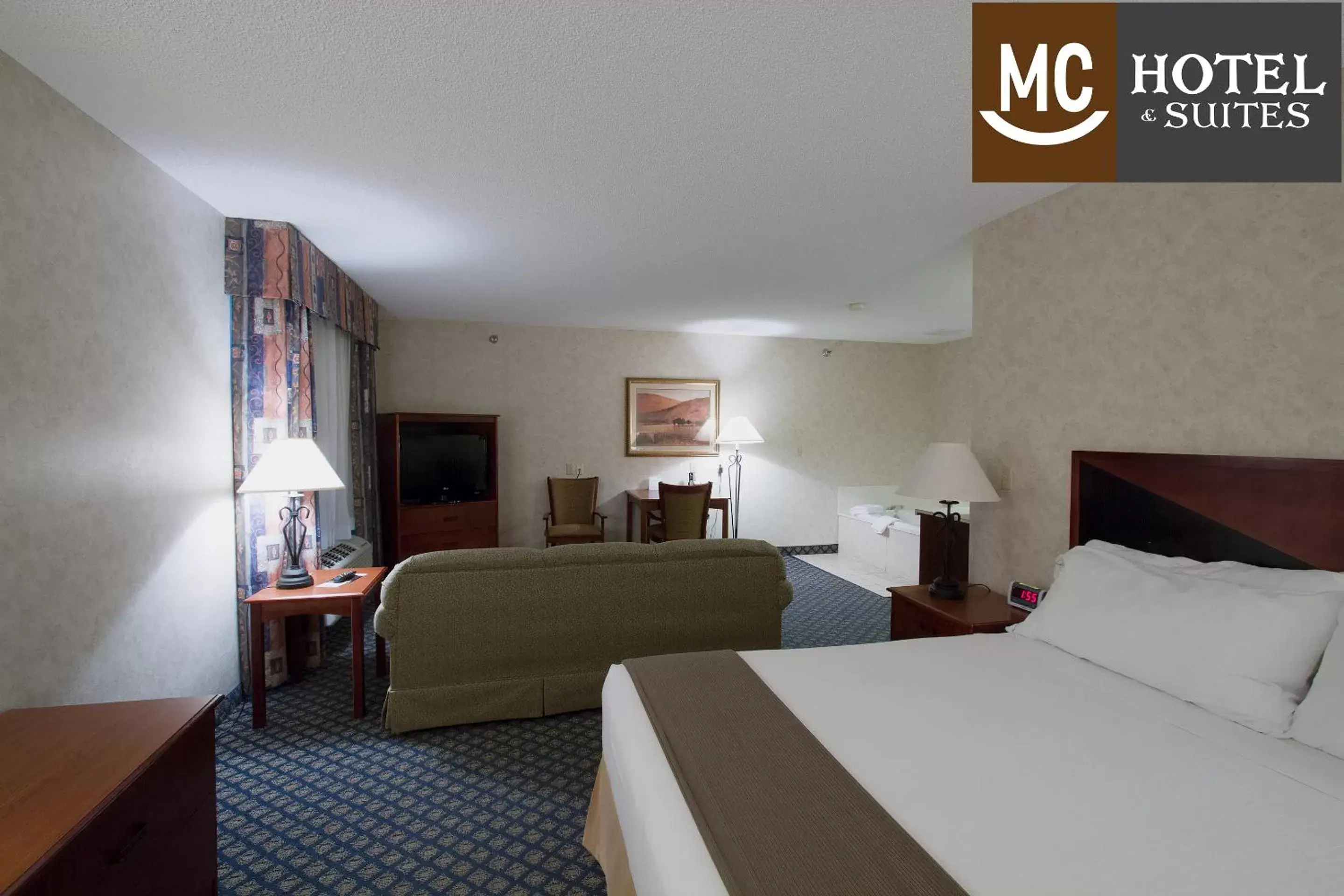 Bed in Miles City Hotel & Suites