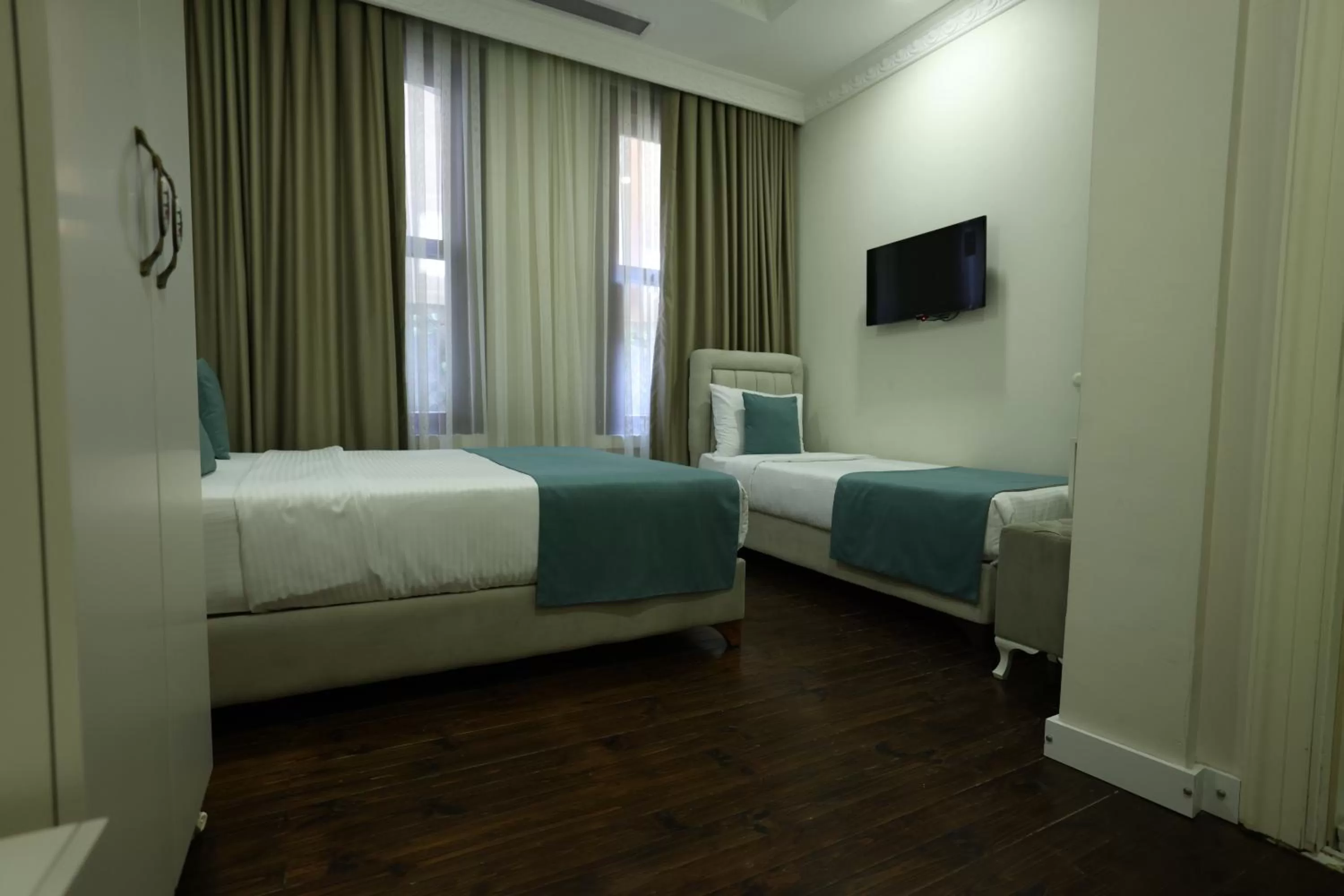 Bed in Nusretbey Hotel