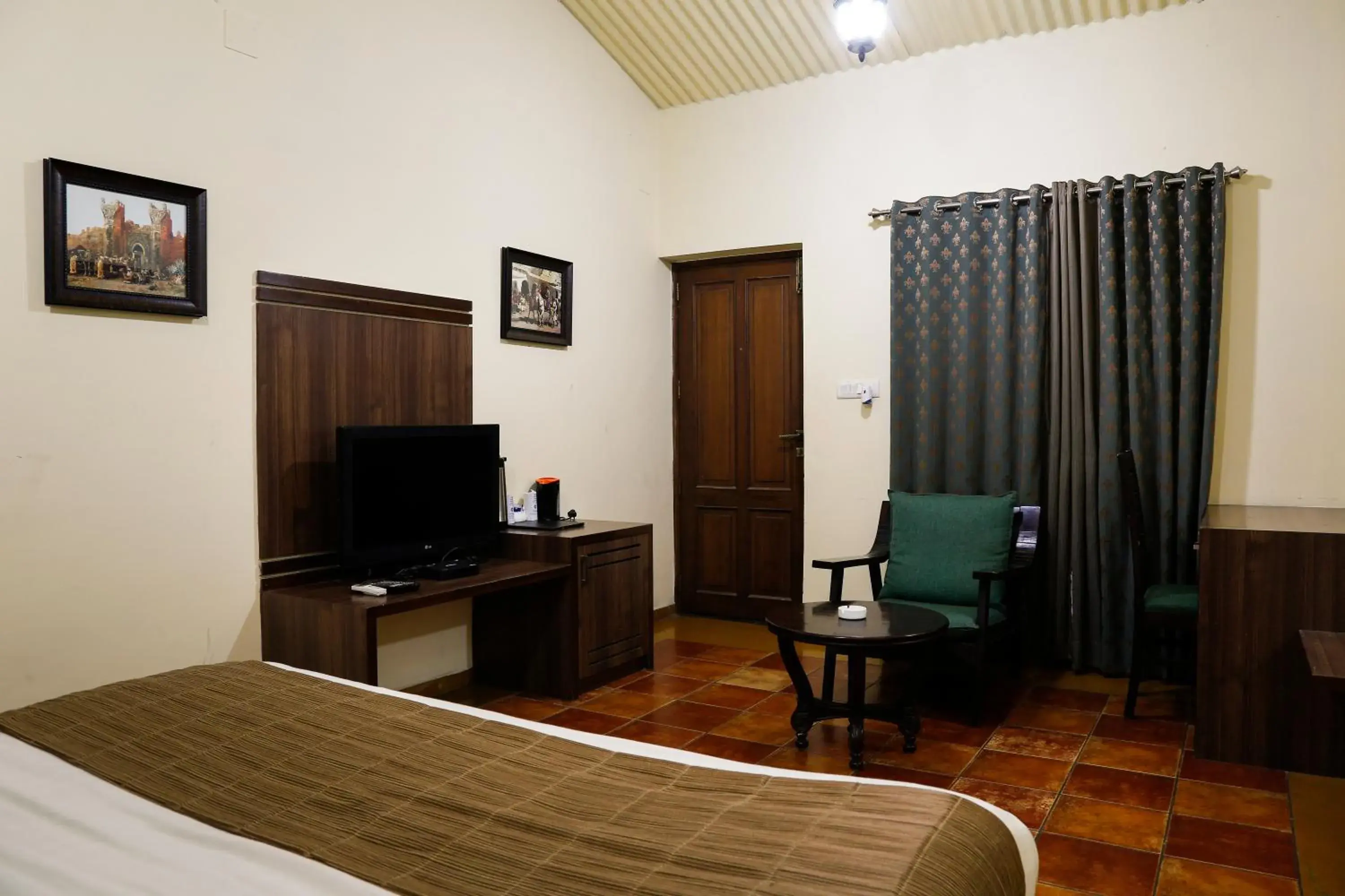 Bedroom, TV/Entertainment Center in The colonial Manek Manor