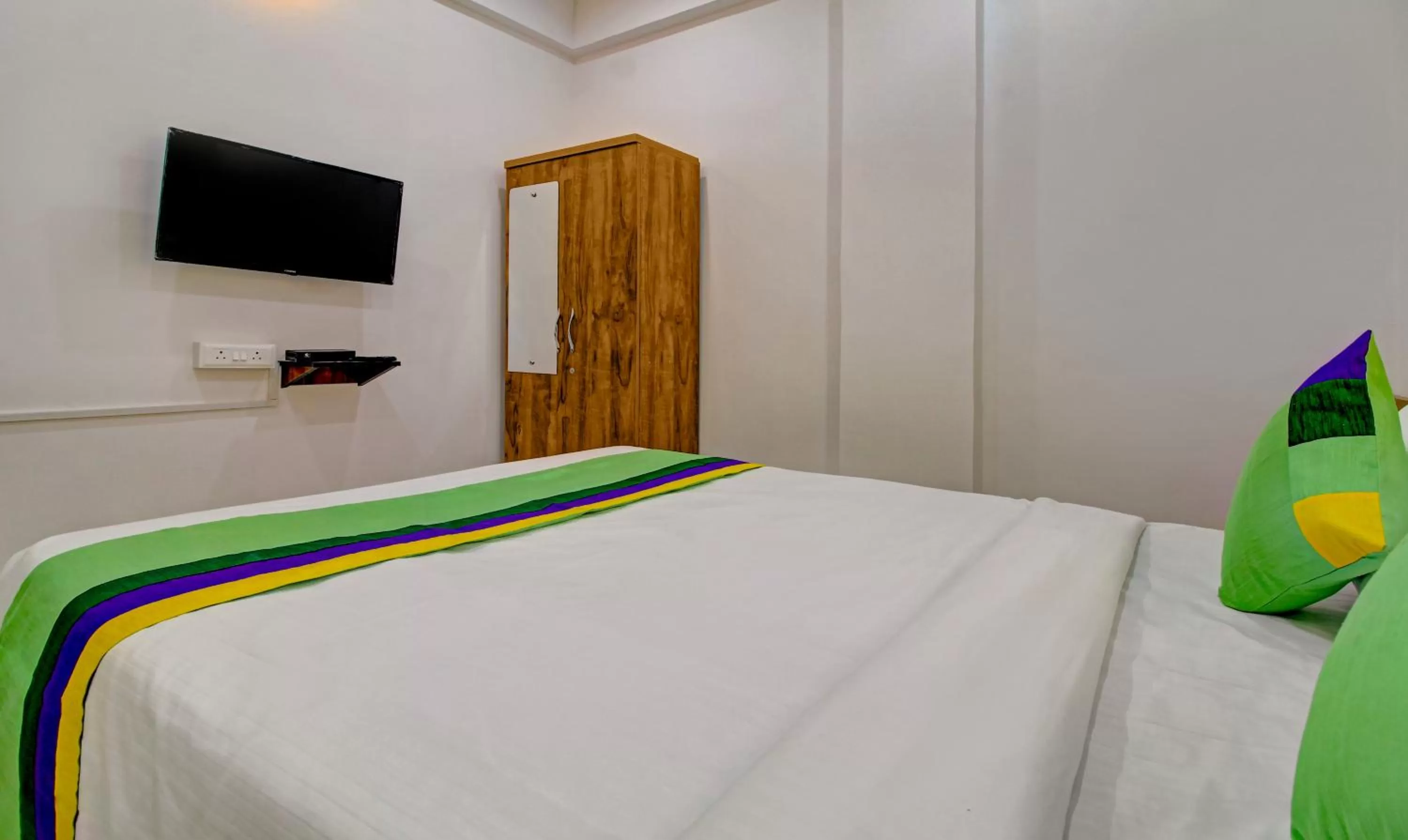 Bed in Treebo Trend White House