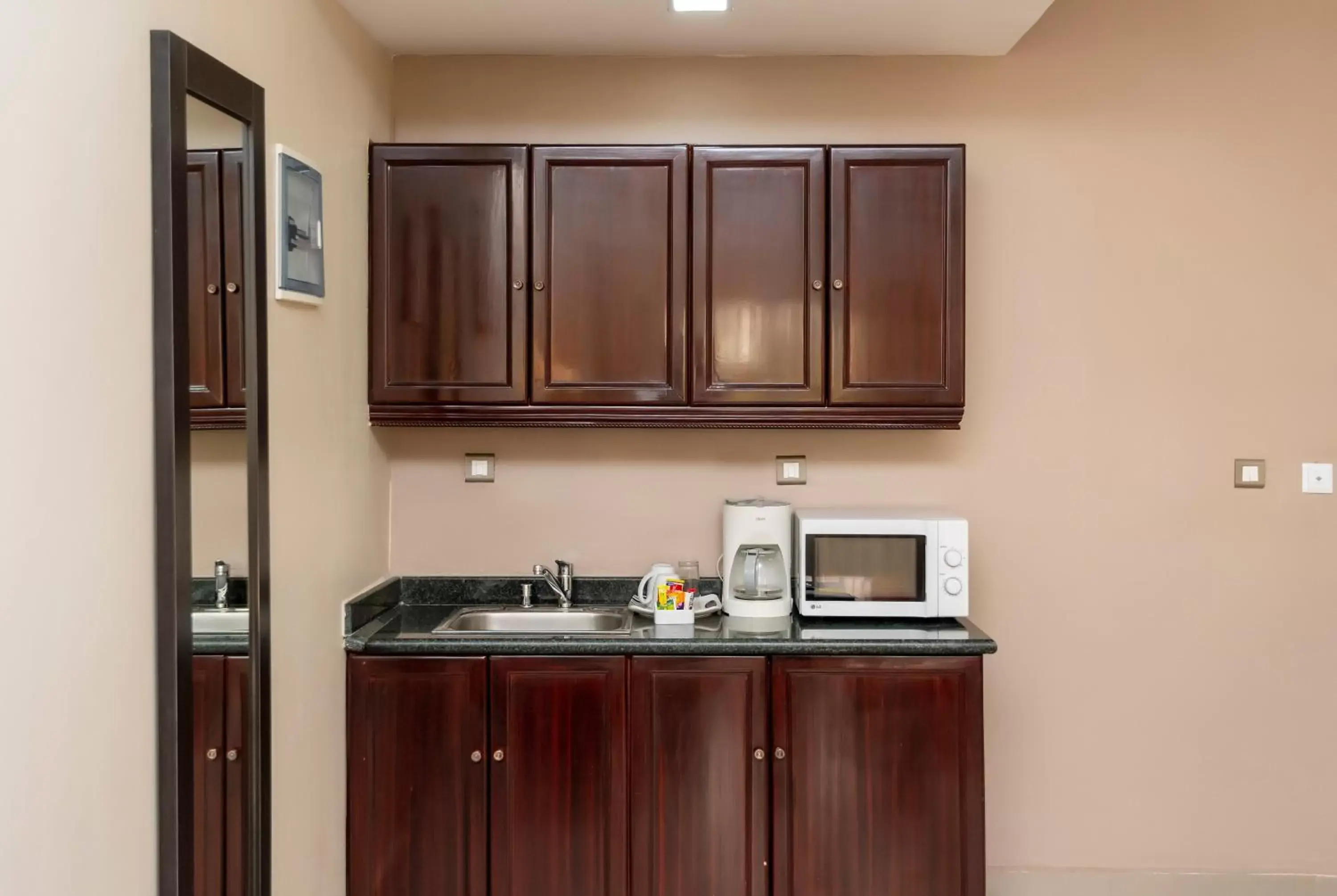 Kitchen or kitchenette, Kitchen/Kitchenette in Hawthorn Suites by Wyndham Abuja