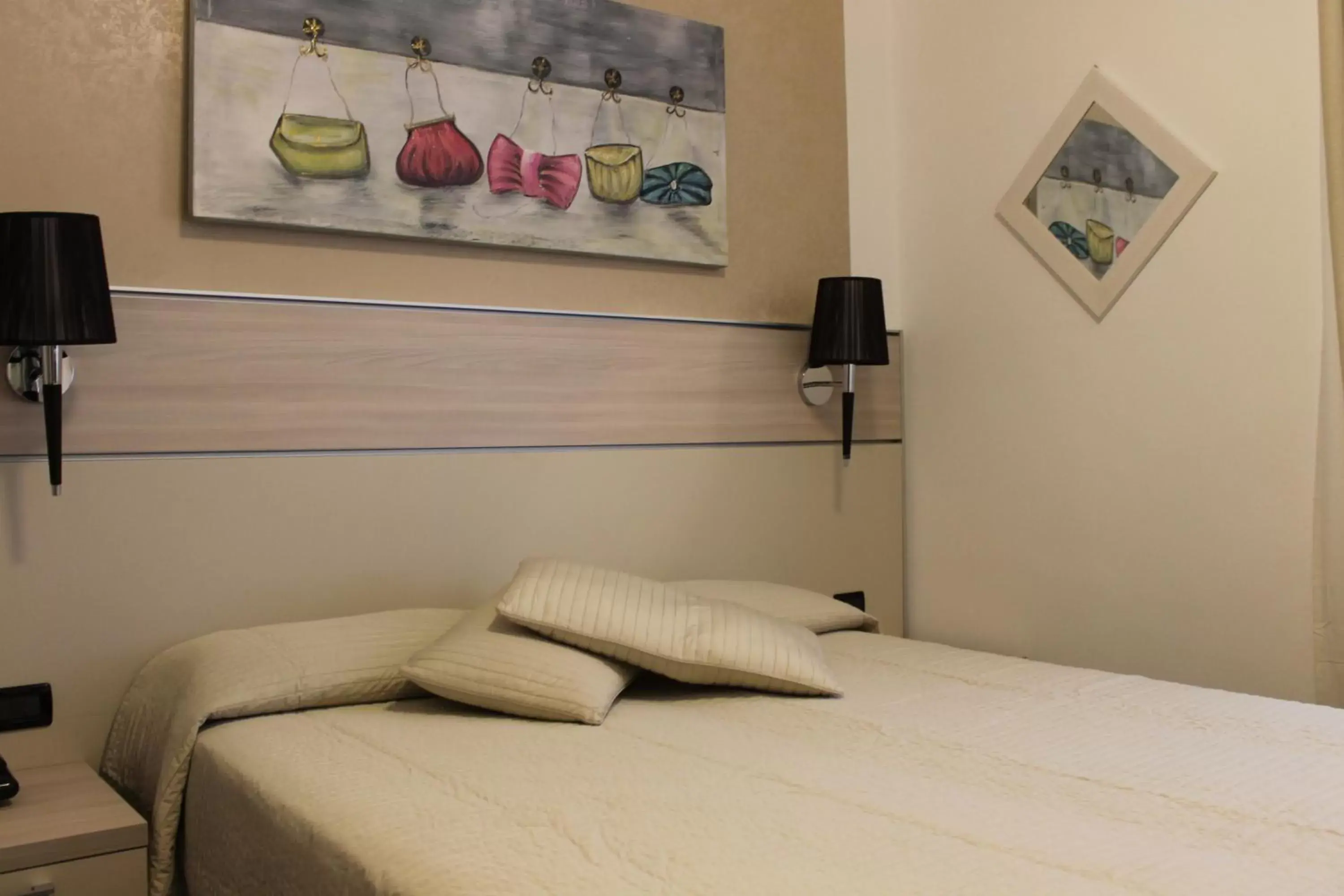 Bed in Coccodrillo Hotel & Apartments