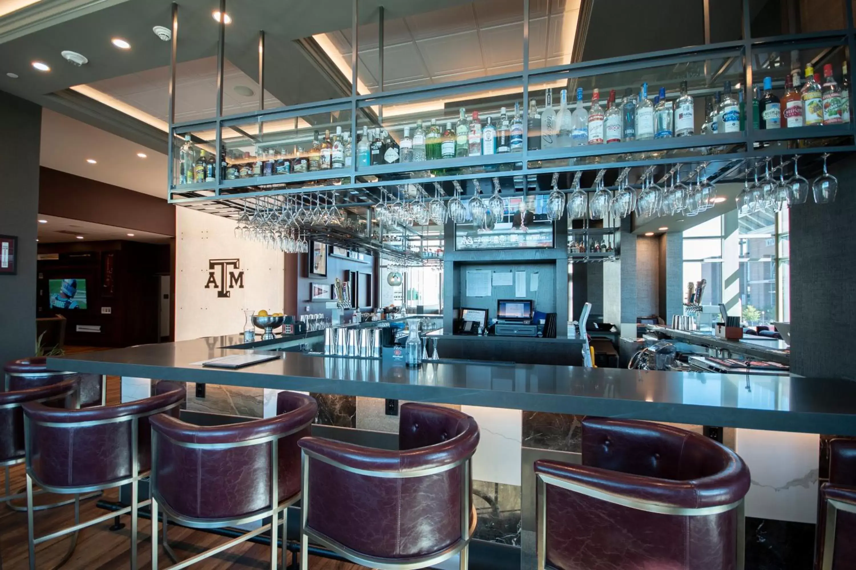 Lounge or bar in Texas A&M Hotel and Conference Center Lounge or bar in Texas A&M Hotel and Conference Center