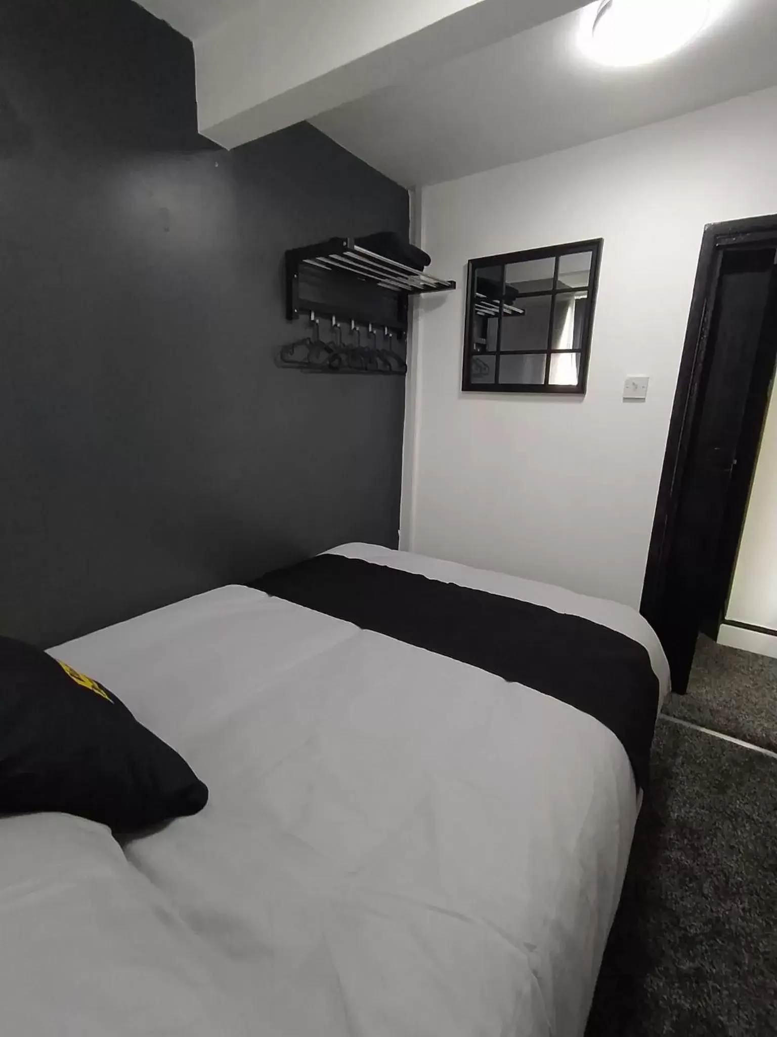 Bed in Black Ocean Holiday Apartments