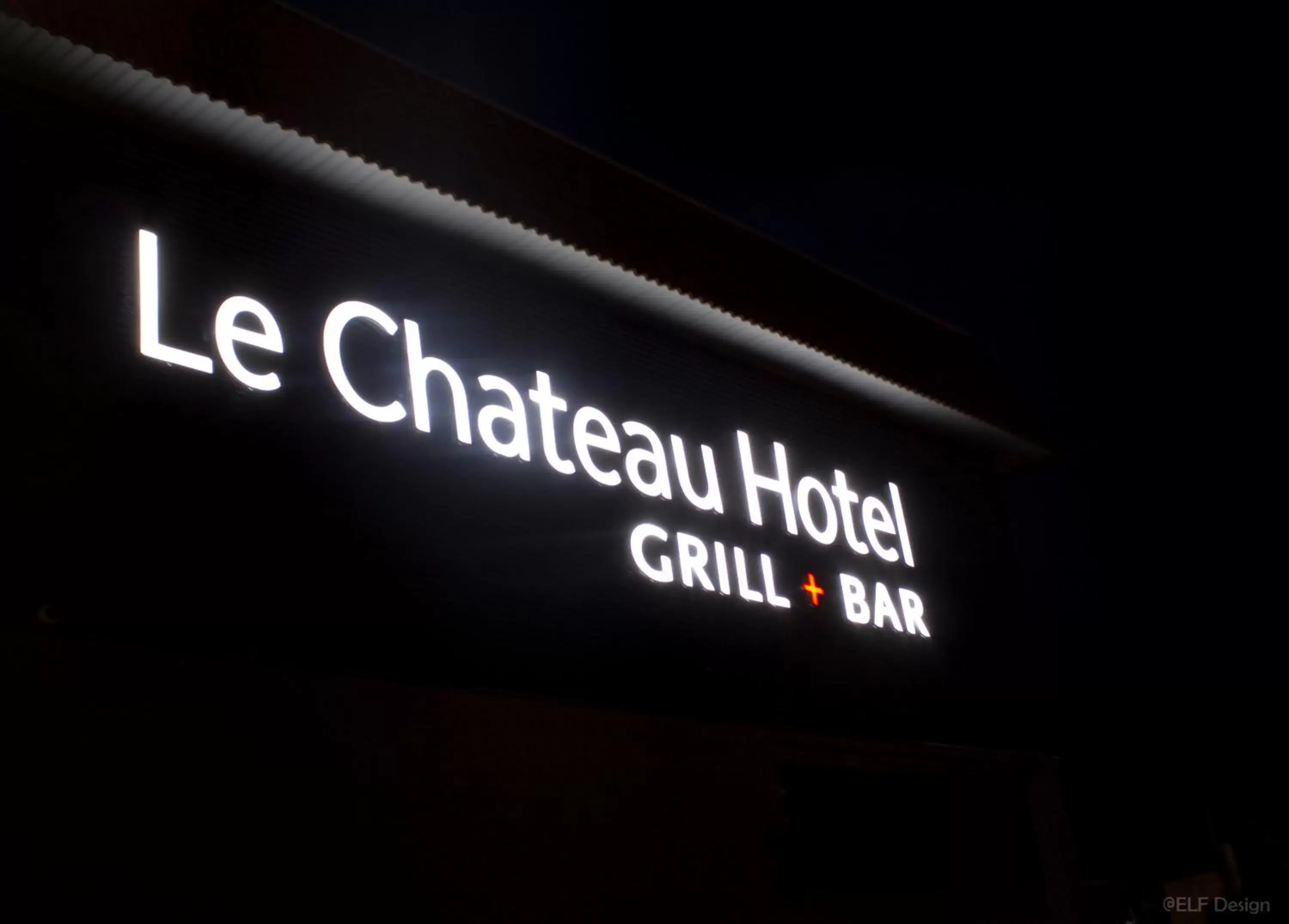 Property building, Property Logo/Sign in Camrose Le Chateau Hotel