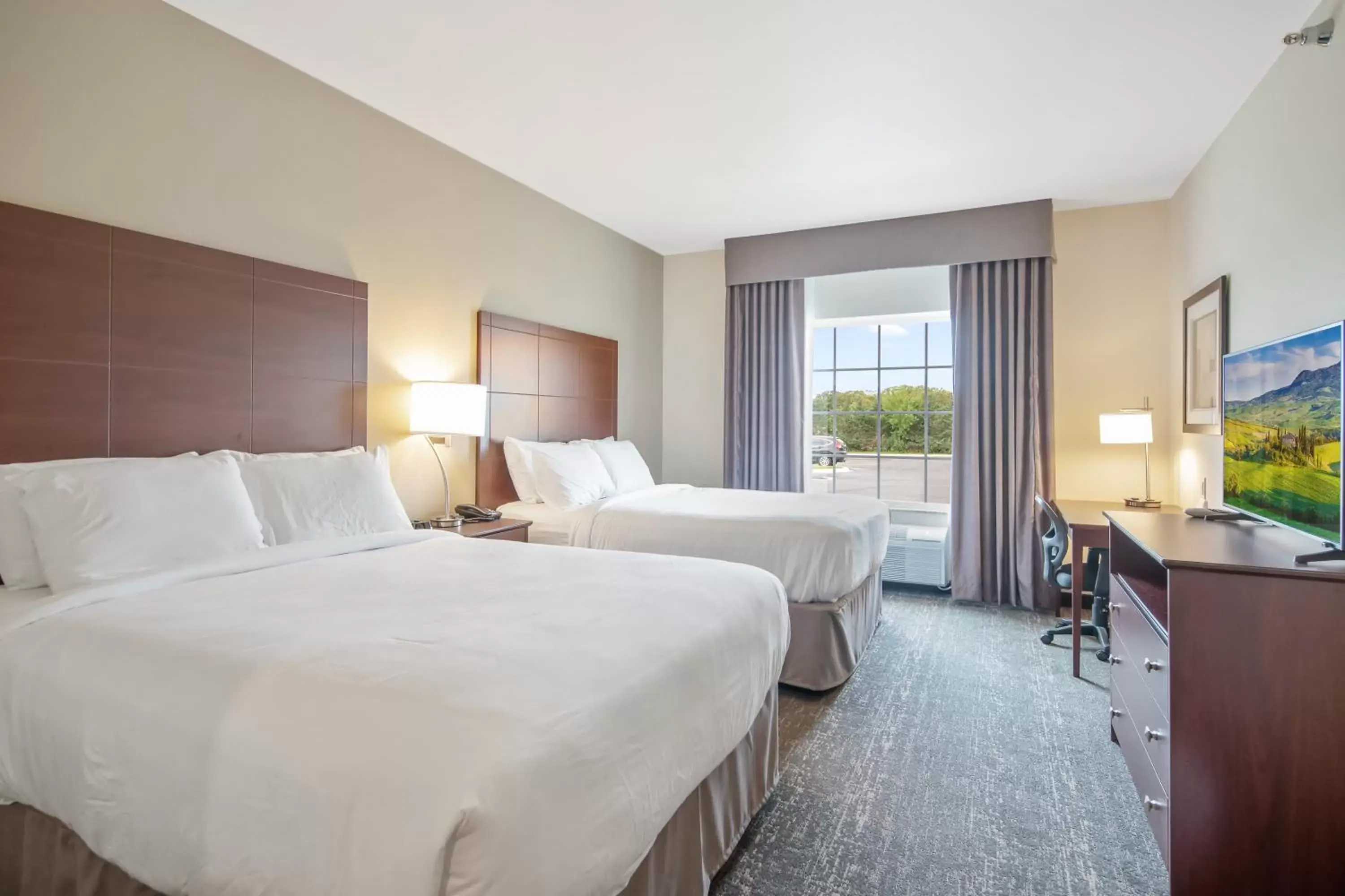 Bed in Cobblestone Hotel & Suites - Austin