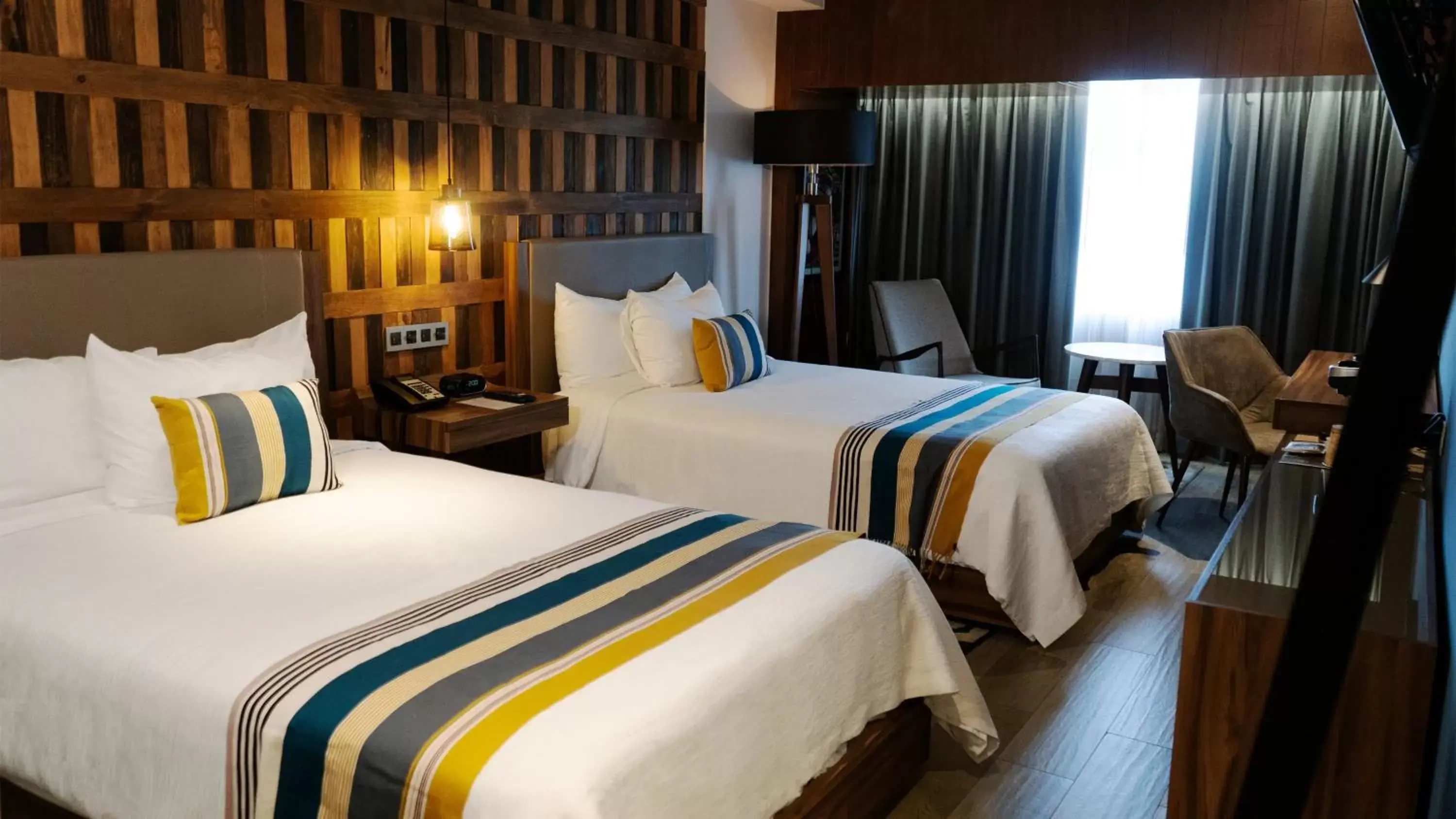 Photo of the whole room, Bed in Hotel Indigo Guadalajara Expo, an IHG Hotel