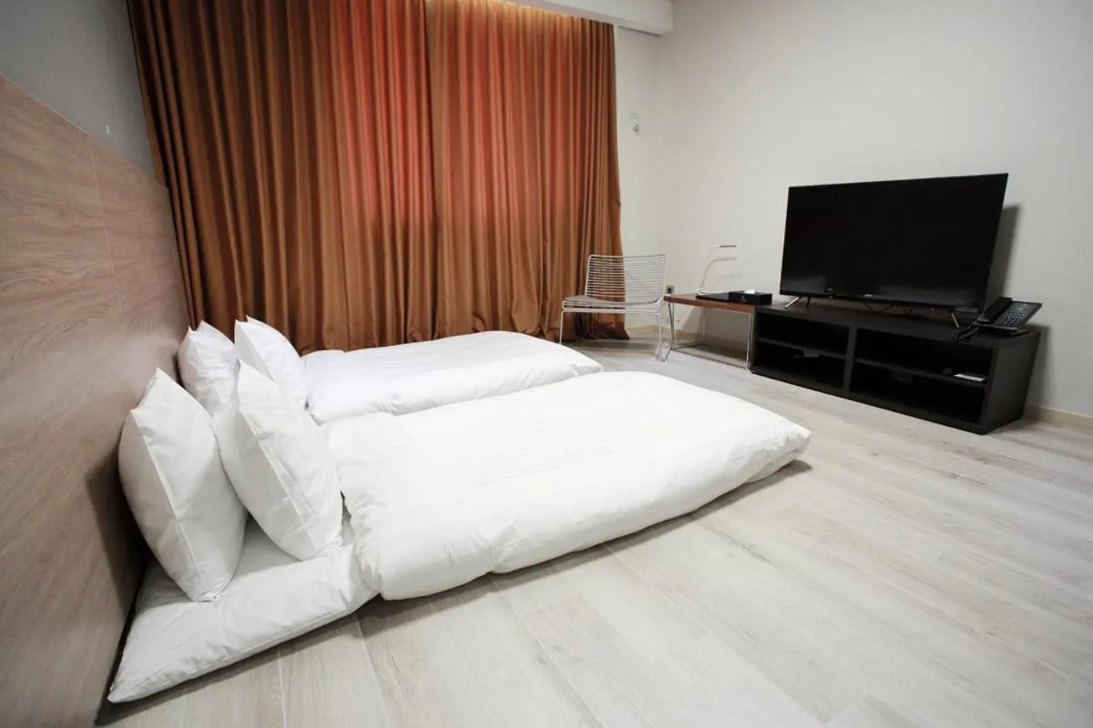 Bed in Gangneung City Hotel