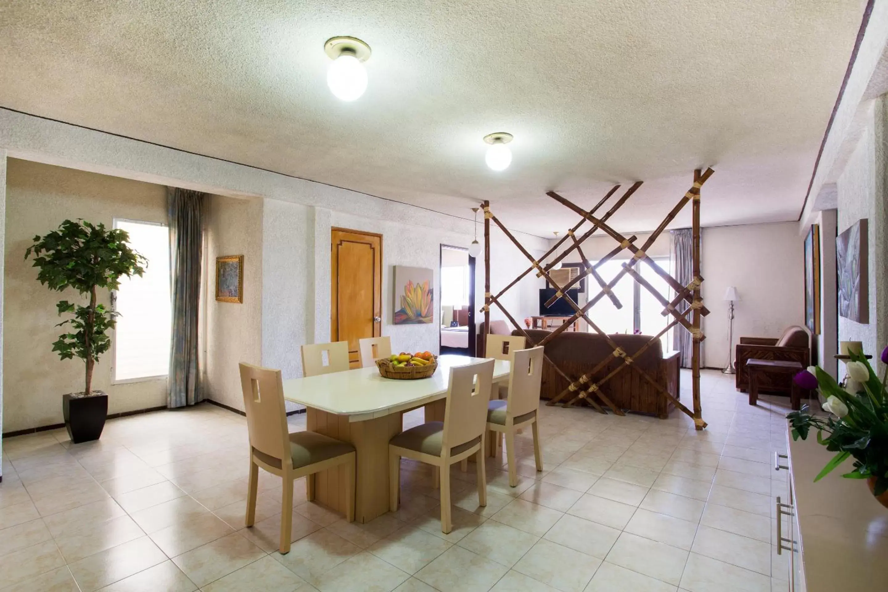 Bedroom, Dining Area in Suites Del Sol