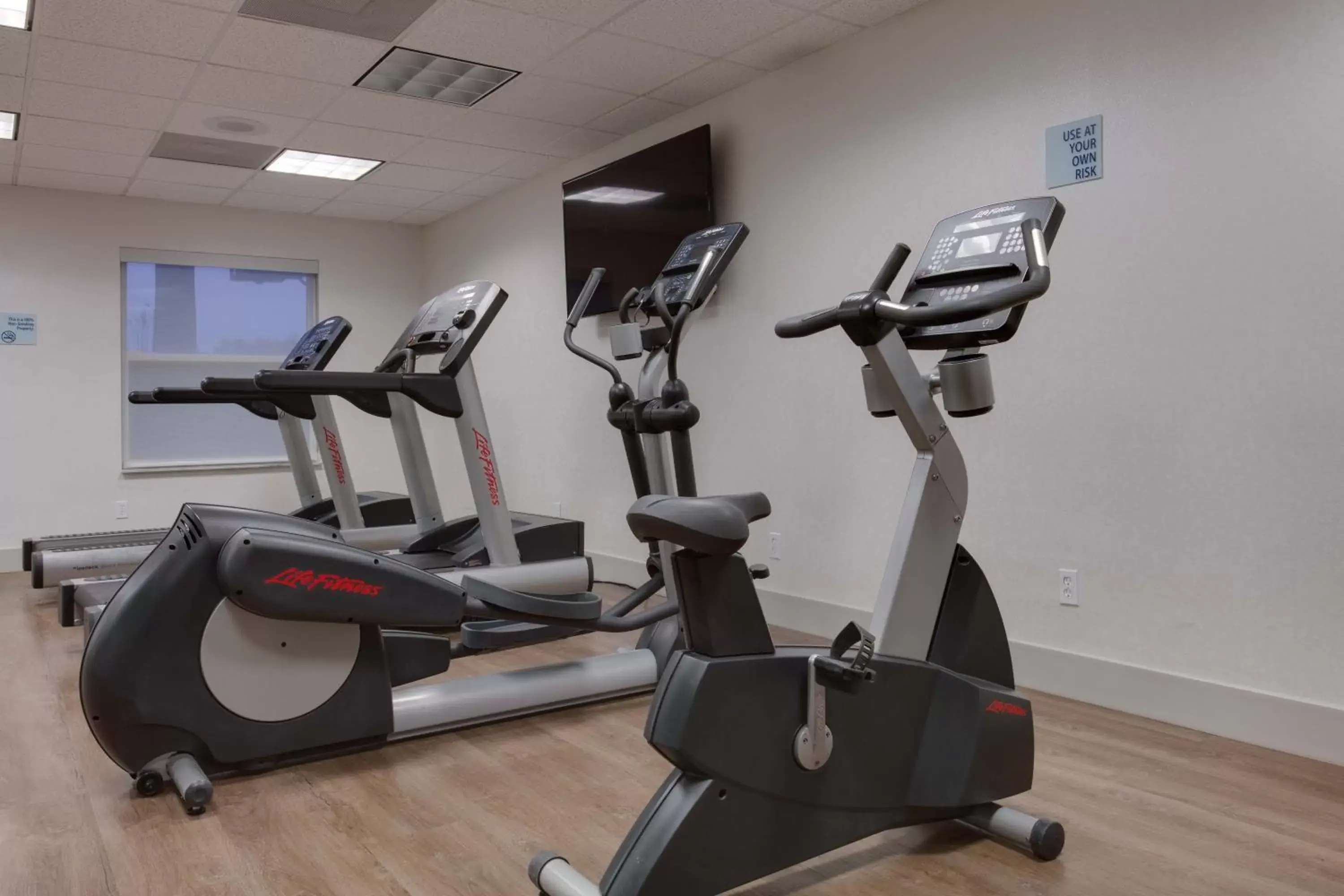 Fitness centre/facilities, Fitness Center/Facilities in Holiday Inn Express & Suites Orlando International Airport, an IHG Hotel