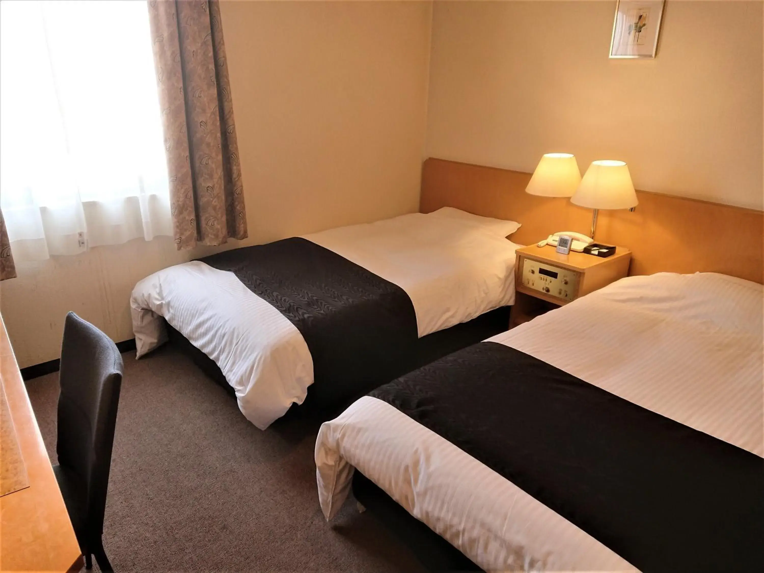 Communal lounge/ TV room, Bed in APA Hotel Kaga Daisyoji-Ekimae