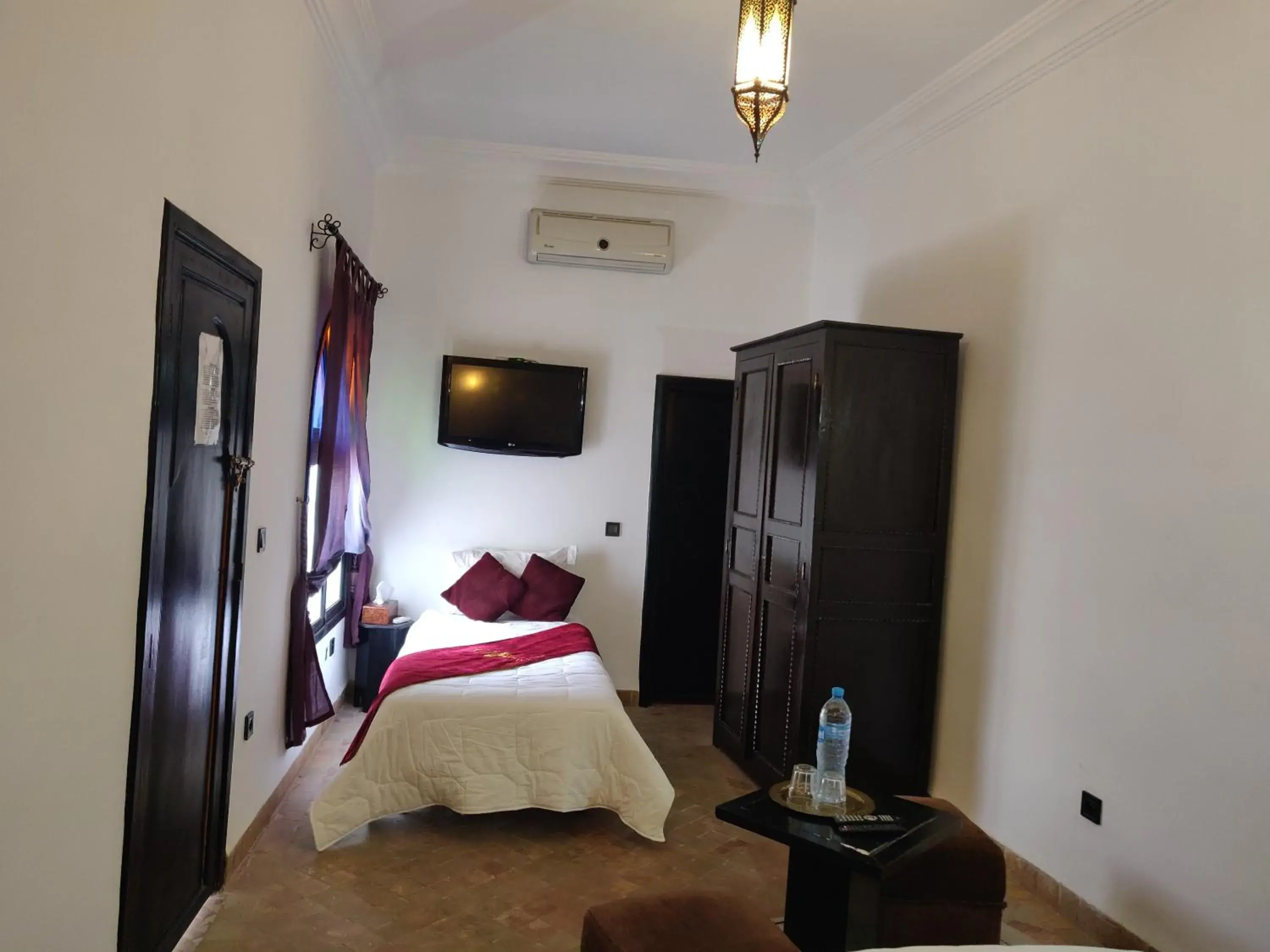 Bedroom, TV/Entertainment Center in Riad Dar Foundouk and Spa