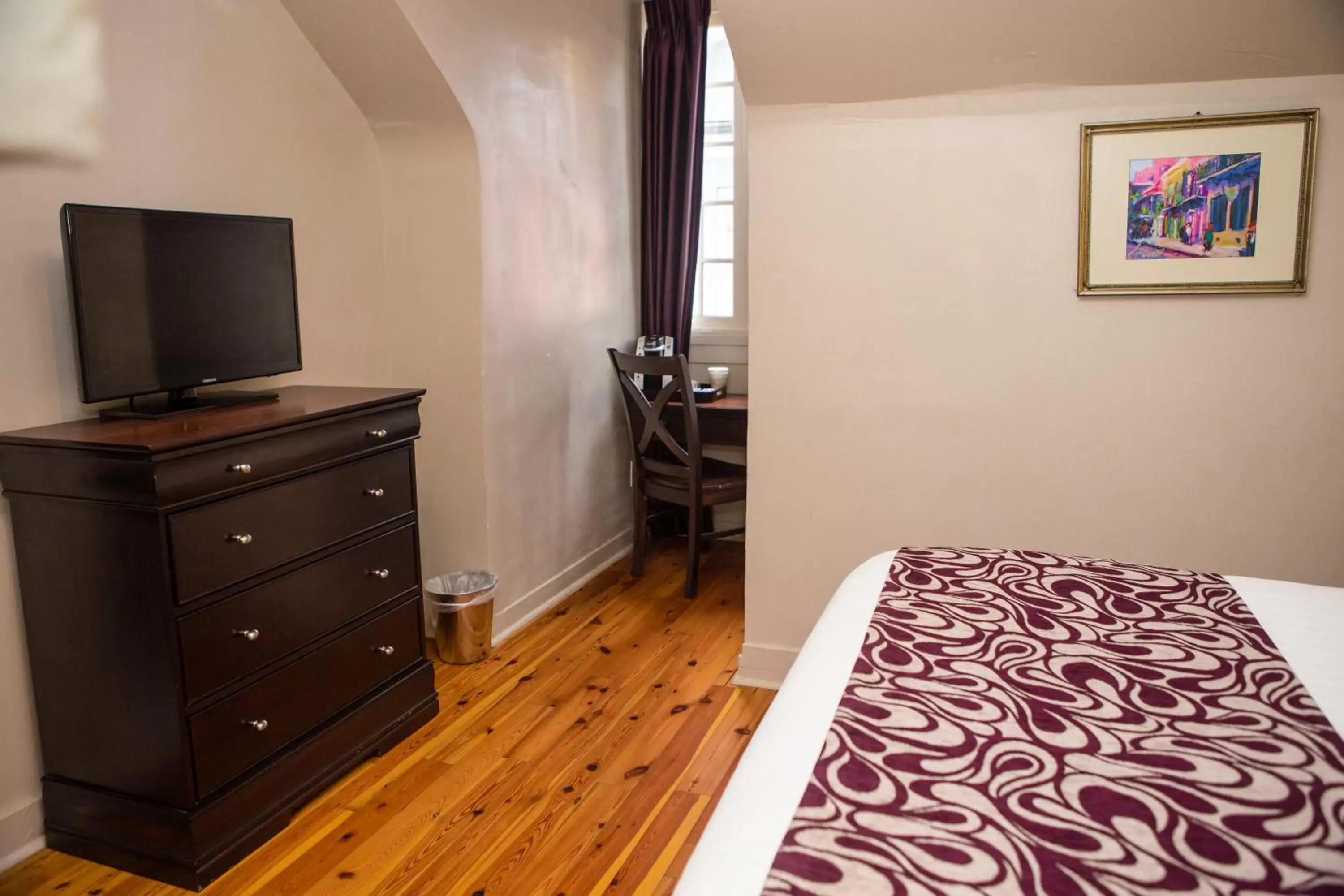 Bed, TV/Entertainment Center in Inn on Ursulines, a French Quarter Guest Houses Property