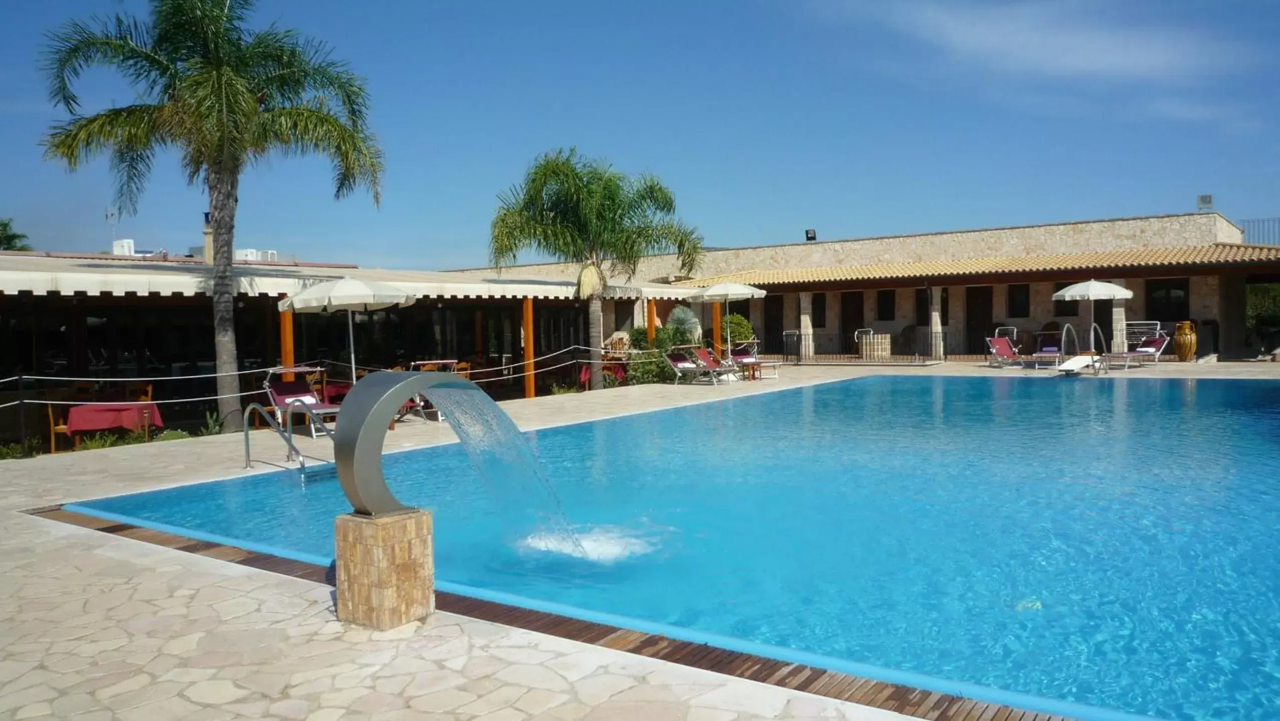 Swimming pool, Property Building in Hotel Masseria Le Pajare