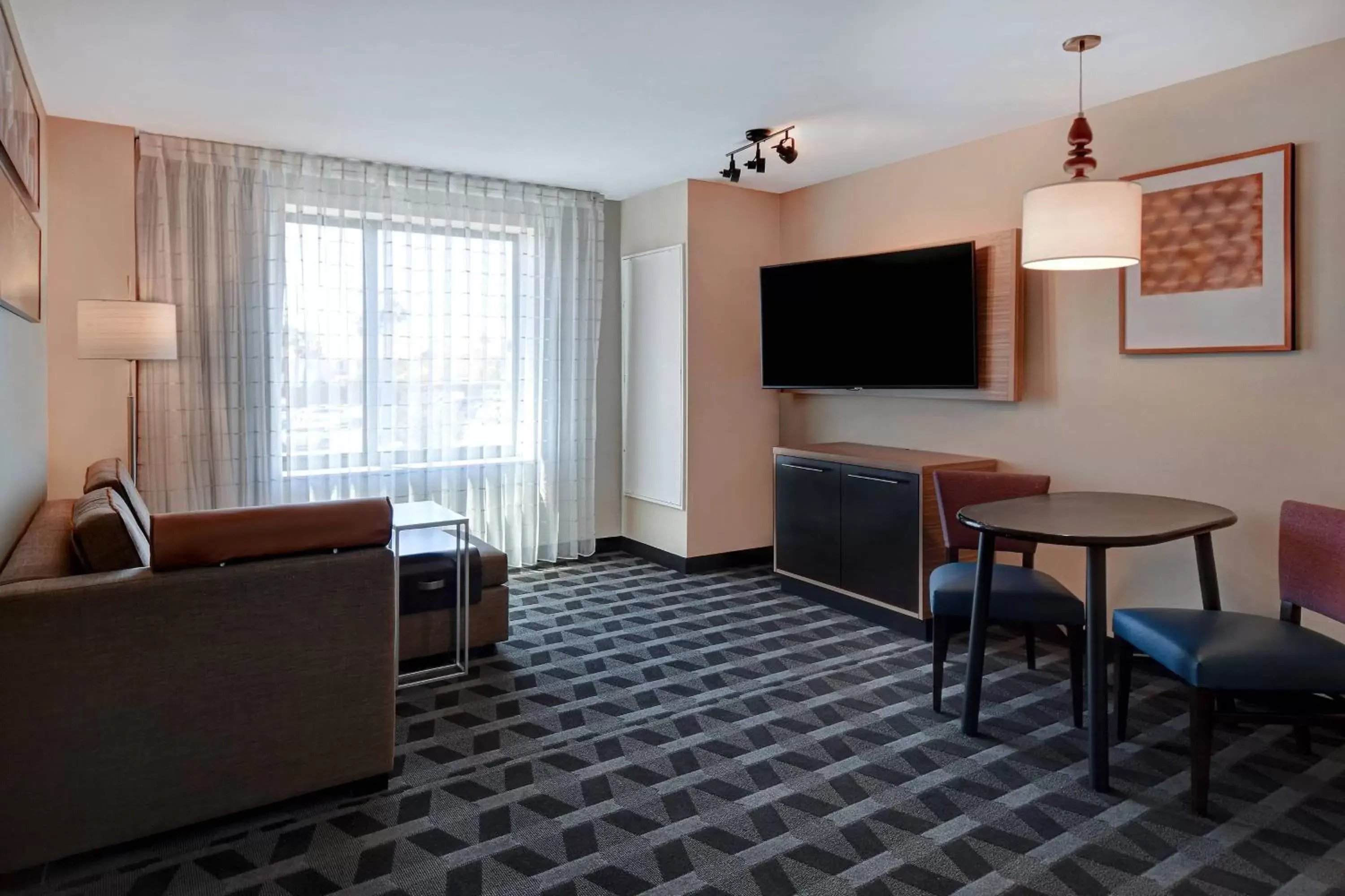 Living room, TV/Entertainment Center in TownePlace Suites Las Vegas Airport South