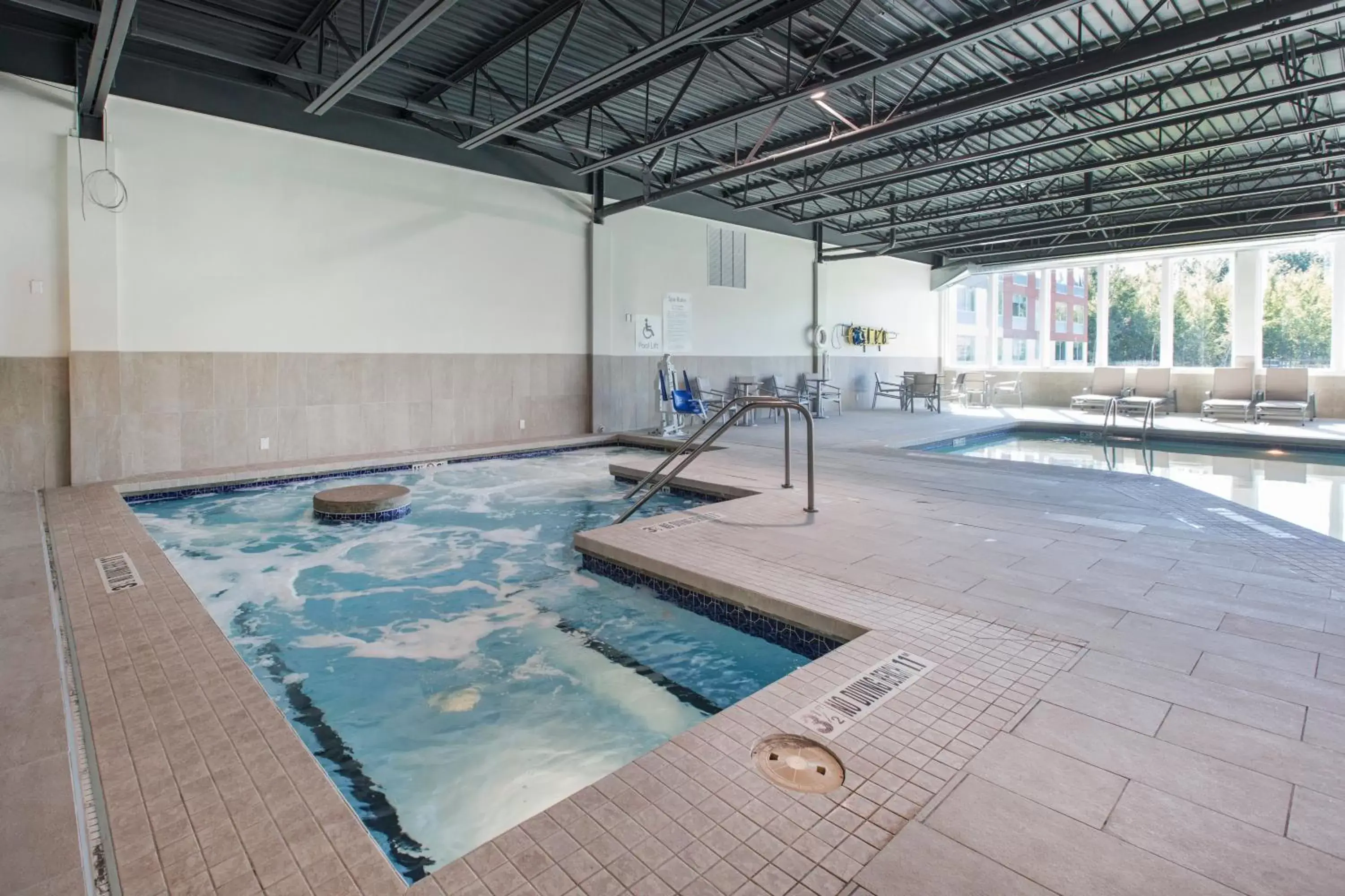 Swimming Pool in Holiday Inn Express & Suites Ludington, an IHG Hotel