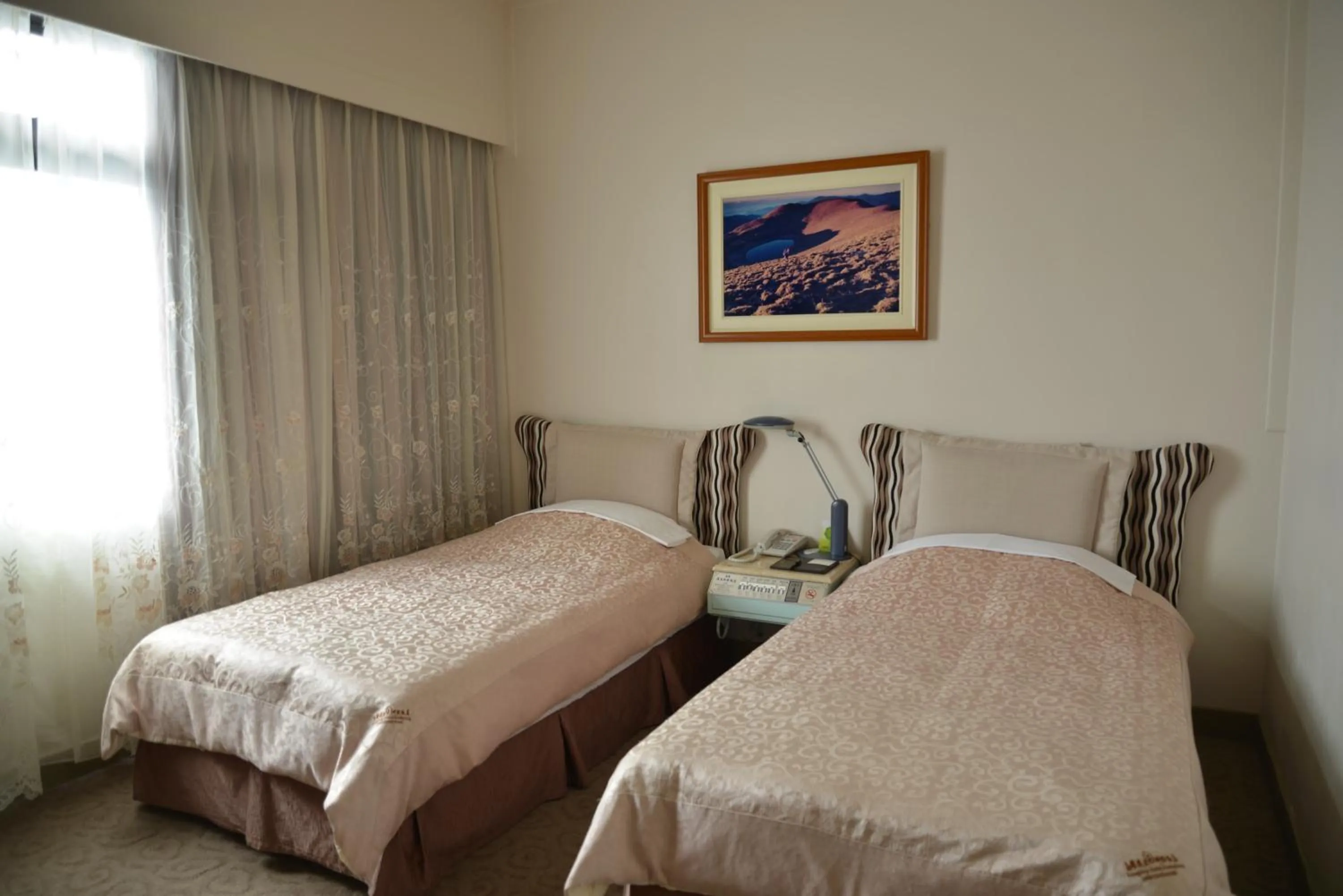 Bed in Kingship Hotel Kaohsiung Inter Continental