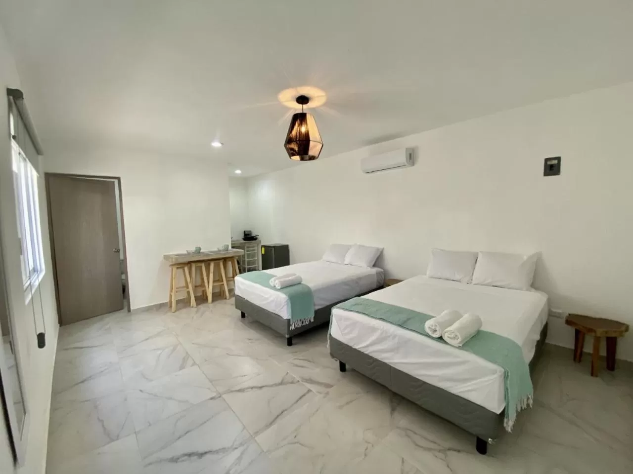 Bed in Casa Colibrí El Cuyo