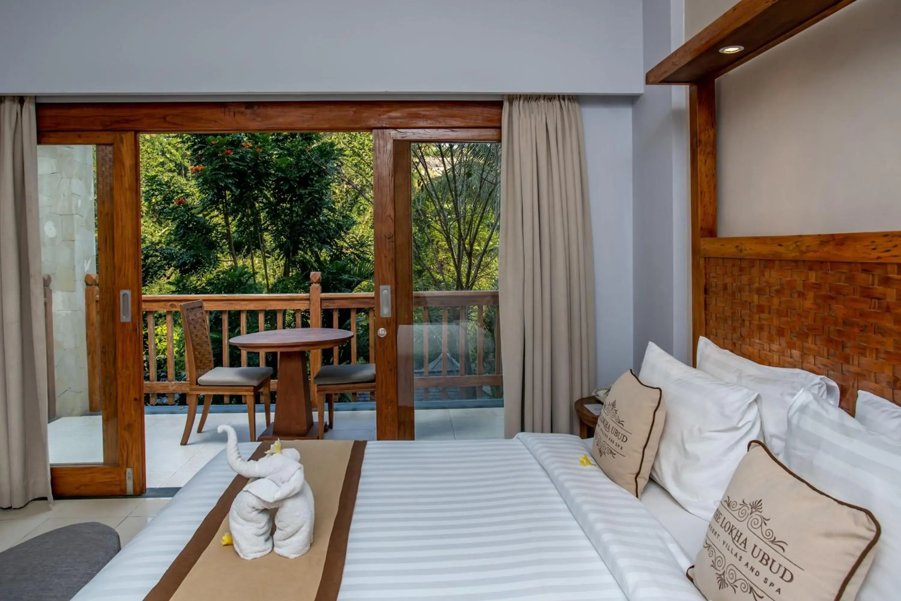 Bed in The Lokha Ubud Resort Villas and Spa