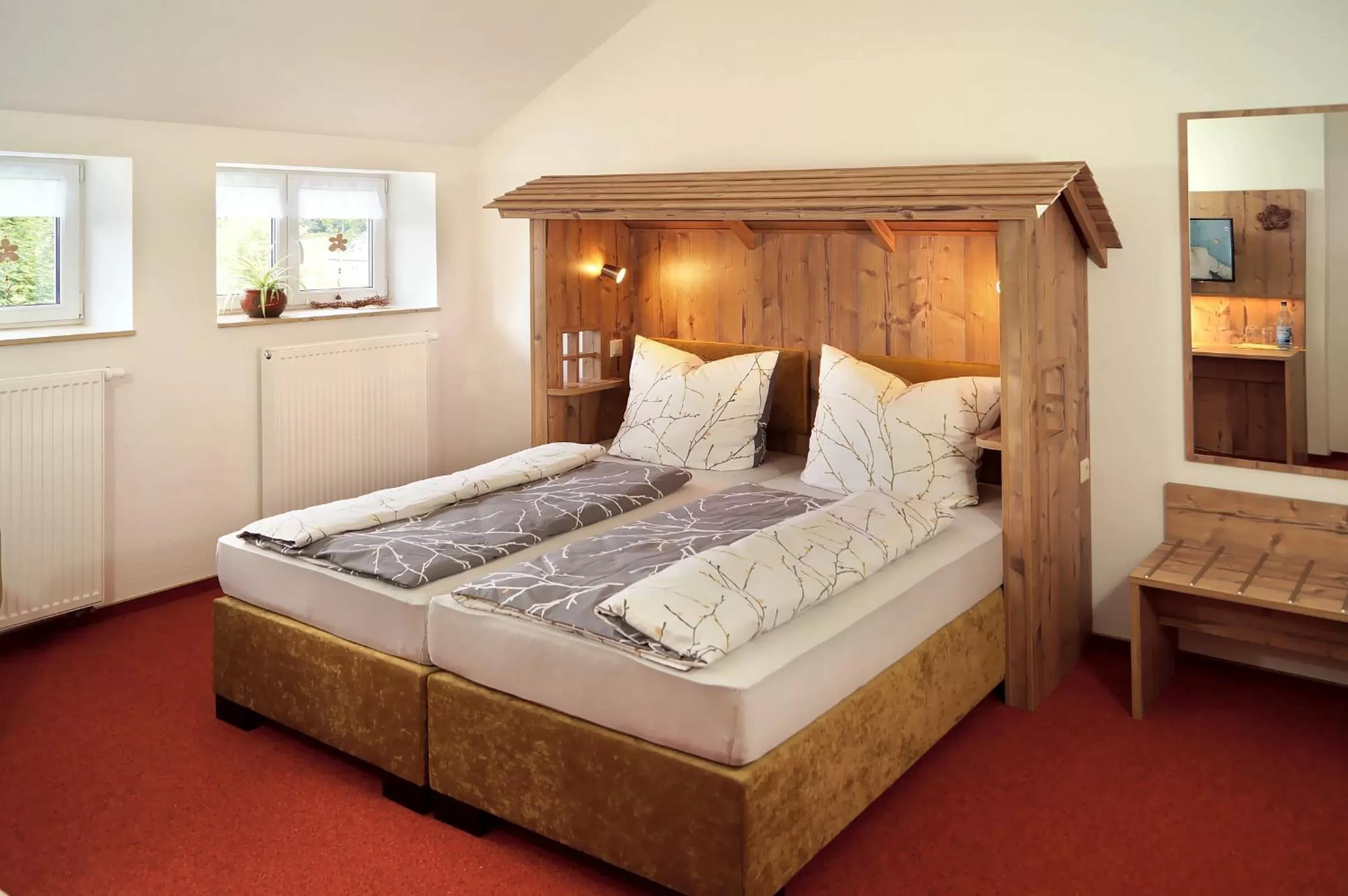 Bed in Erzgebirgshotel Misnia Bärenfels