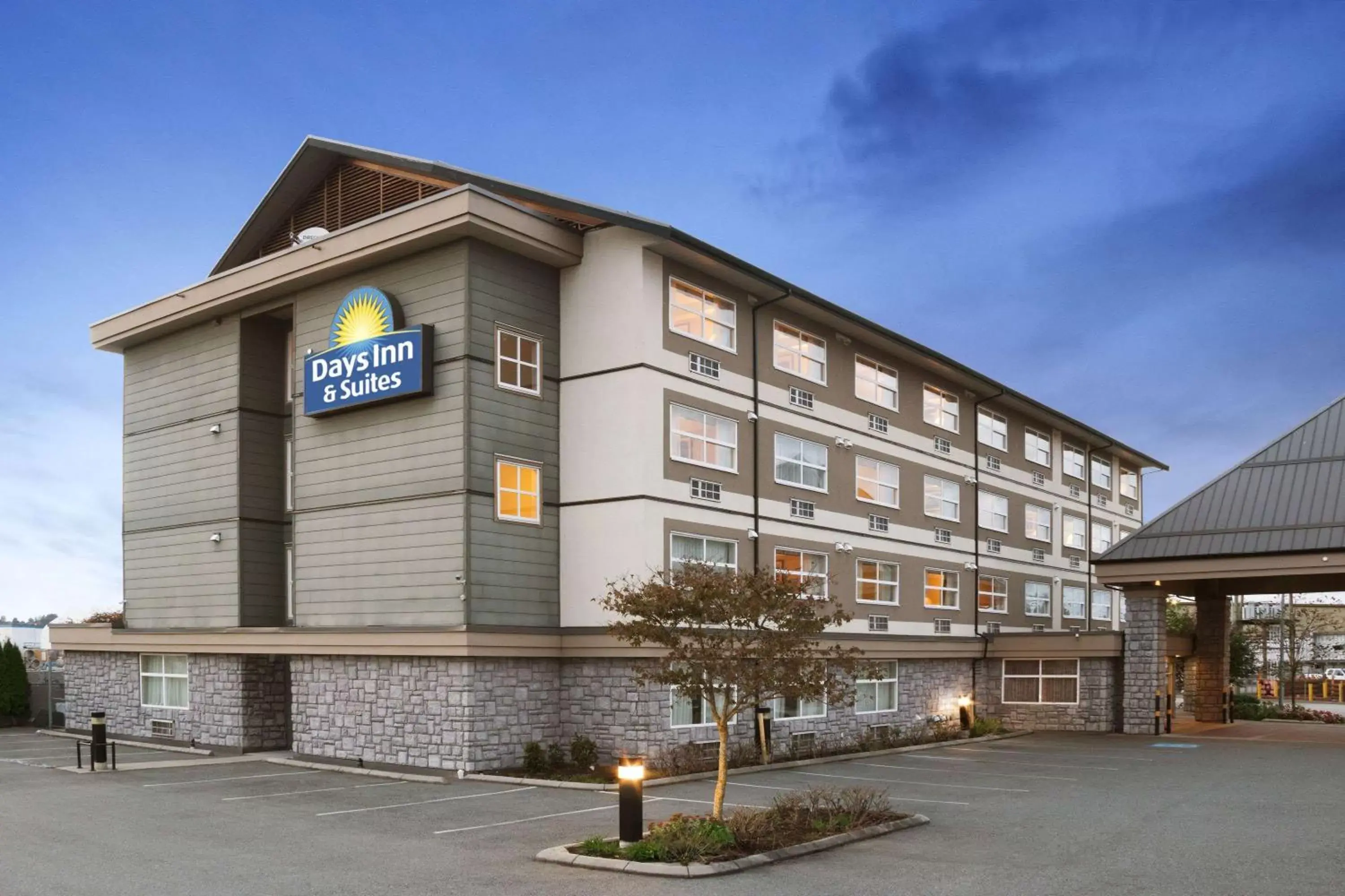 Property building in Days Inn & Suites by Wyndham Langley