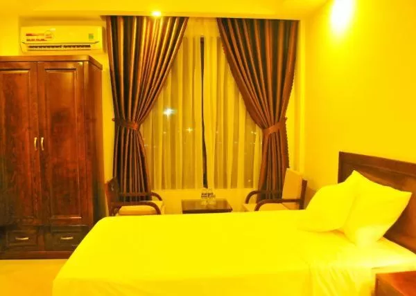 Bed in Aries Hotel