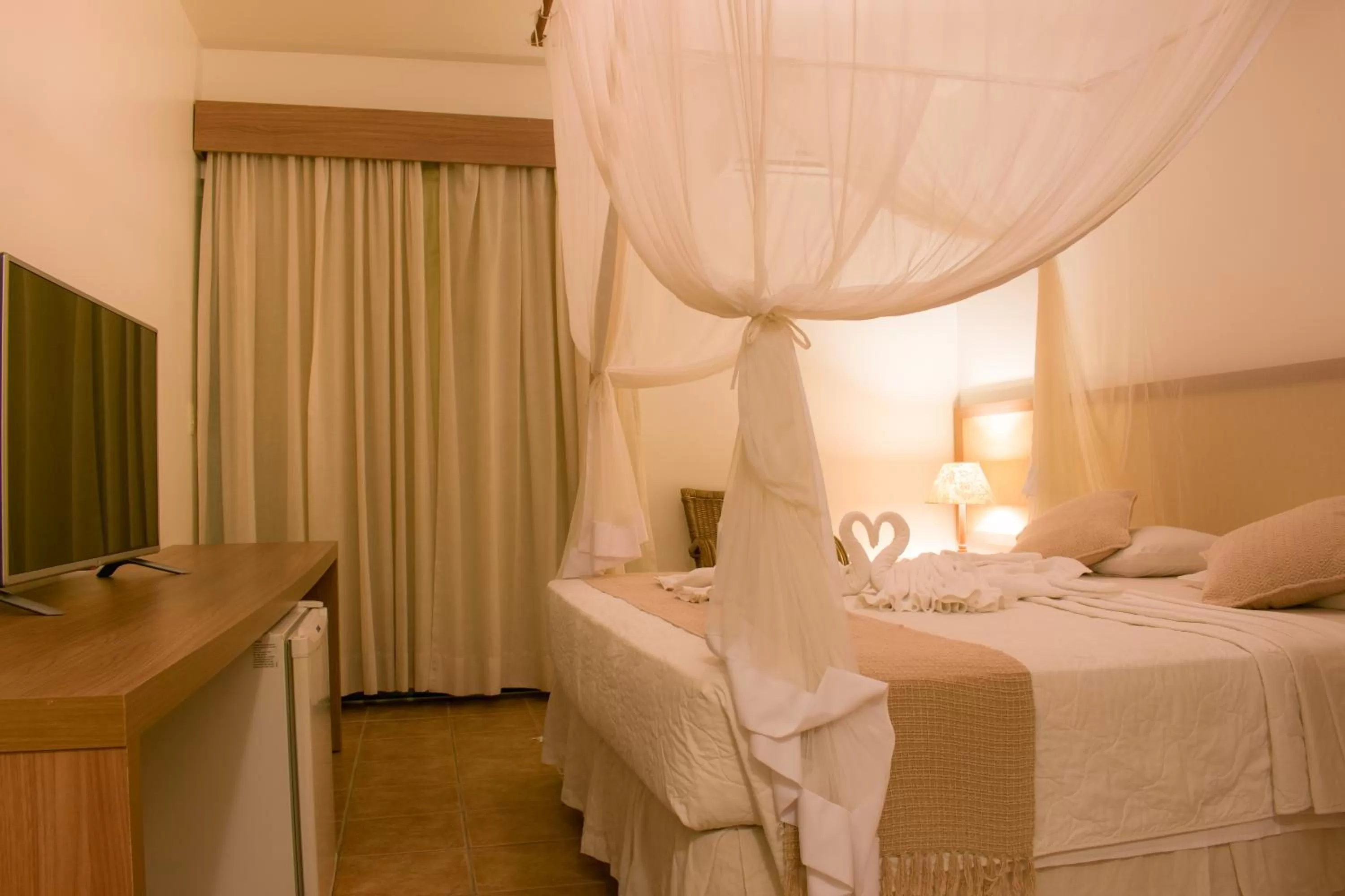 Bed in Sarana Praia Hotel