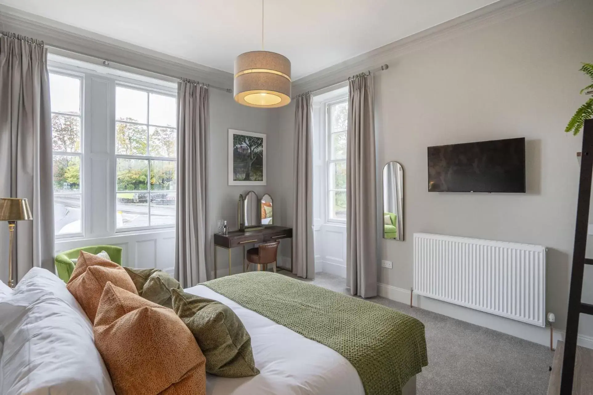 Bed, Seating Area in The Woodside