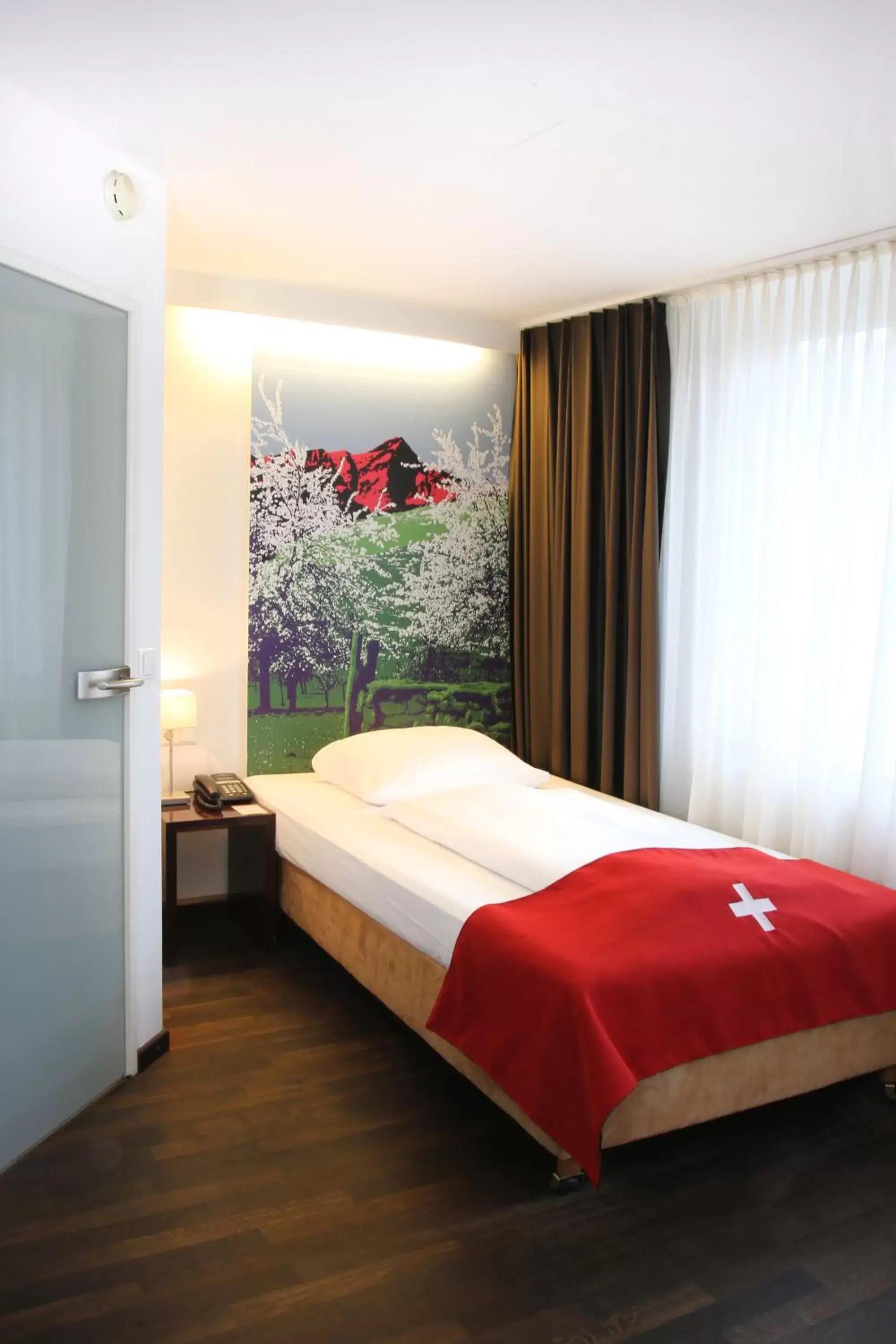 Bedroom, Bed in Helvetia Hotel Munich City Center