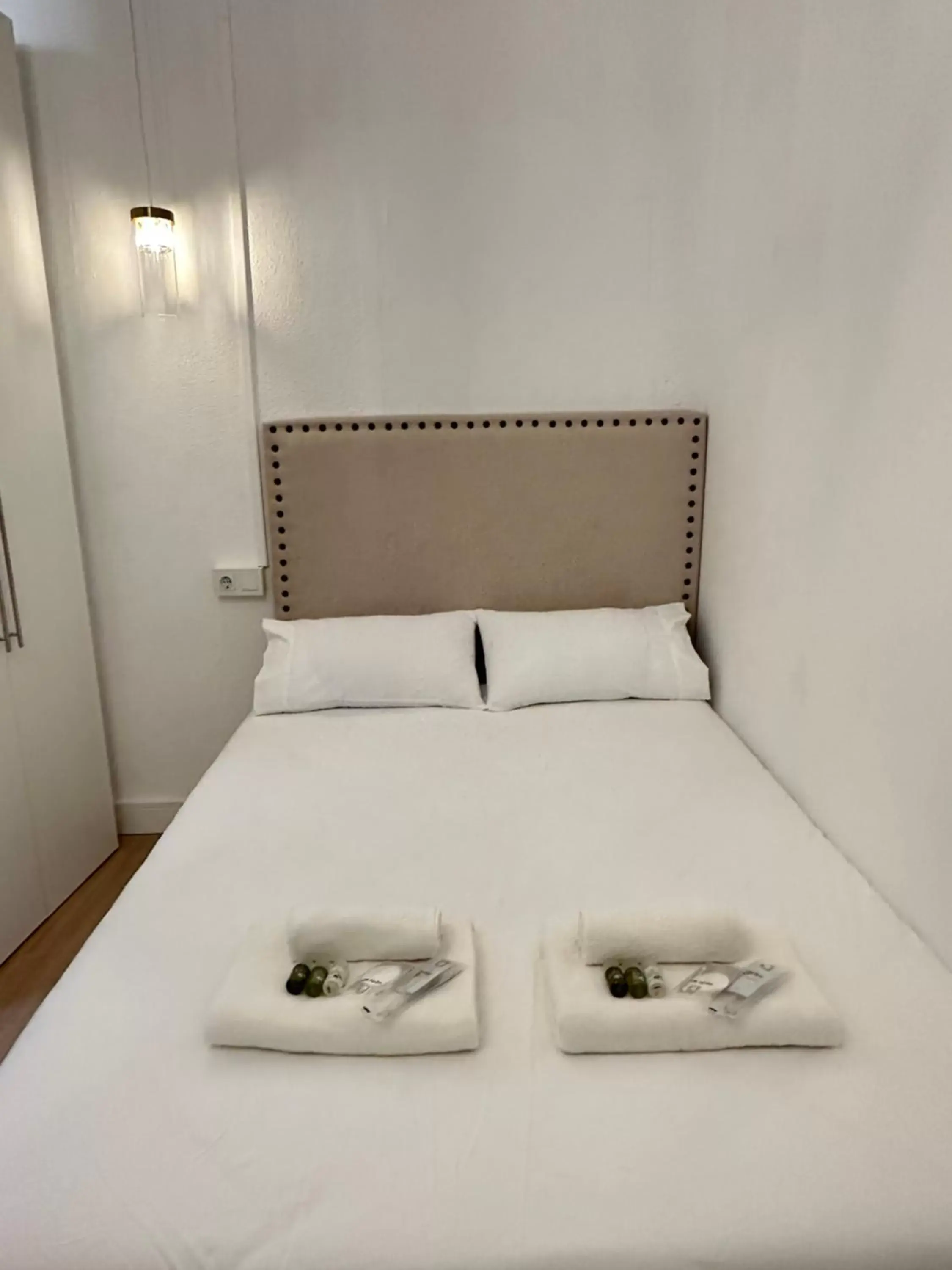 Bed in Siboni Luxury Rooms - Adults Only