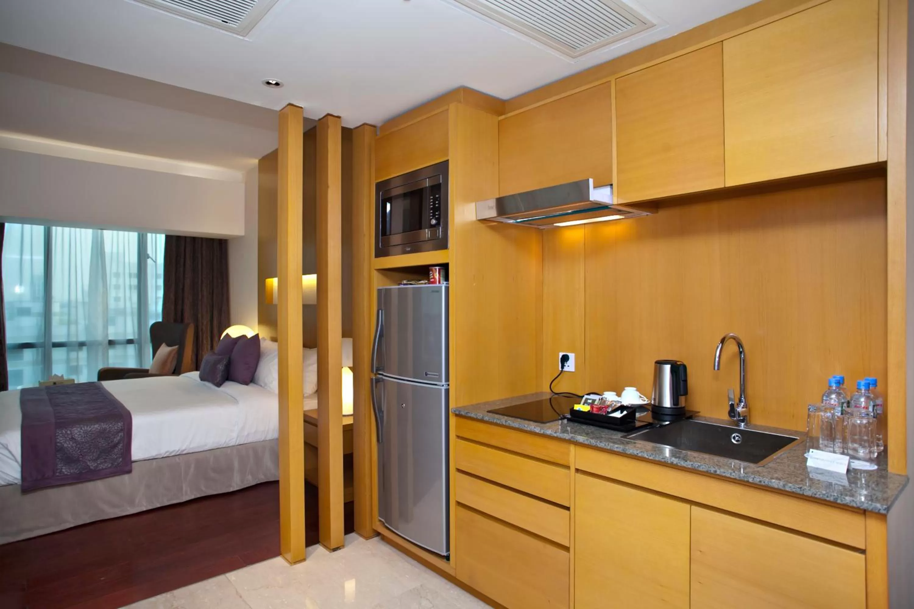 Kitchen or kitchenette, Bed in Lakeshore Suites, Banani