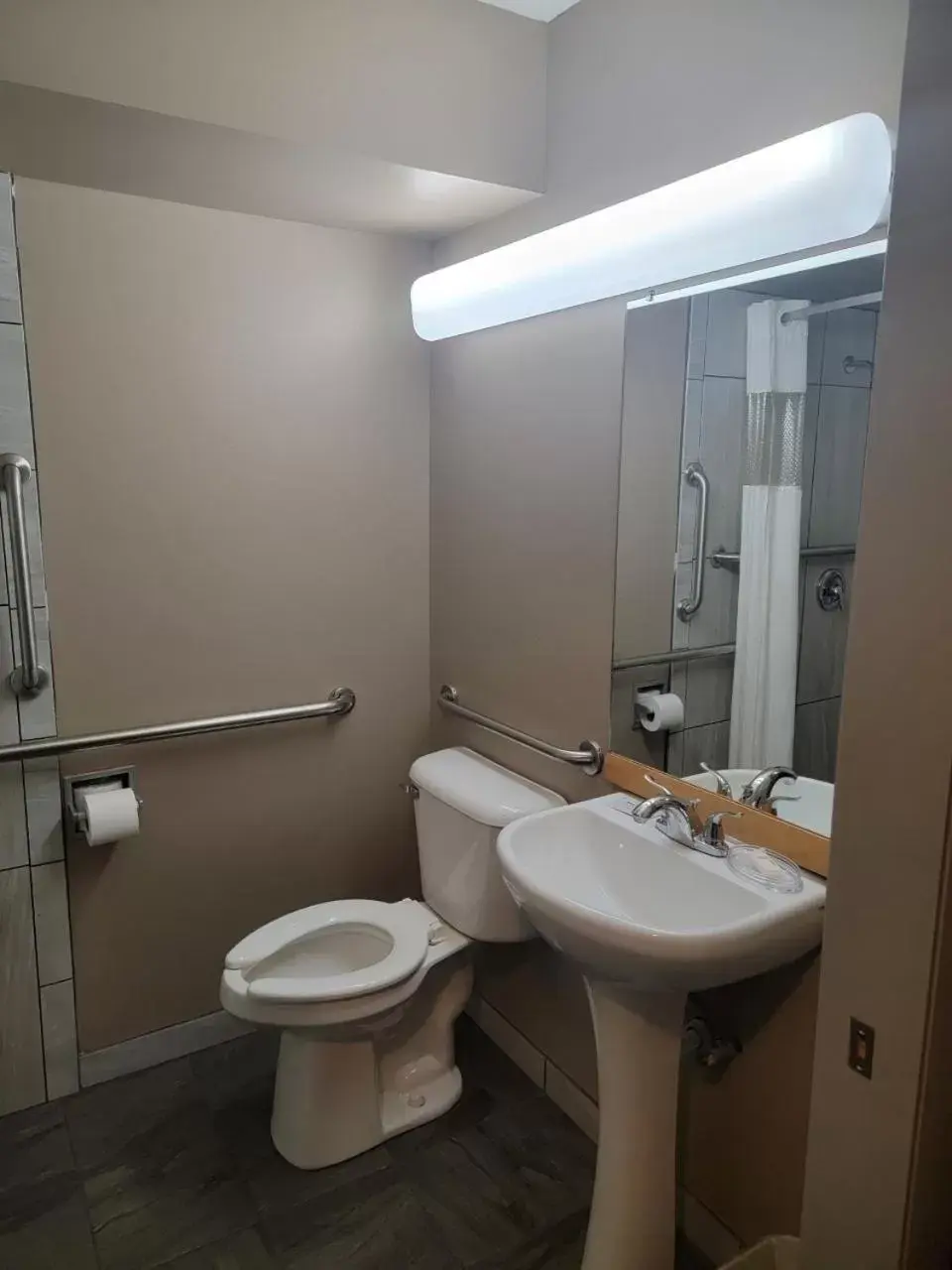 Bathroom in Ramada by Wyndham Angola/Fremont Area