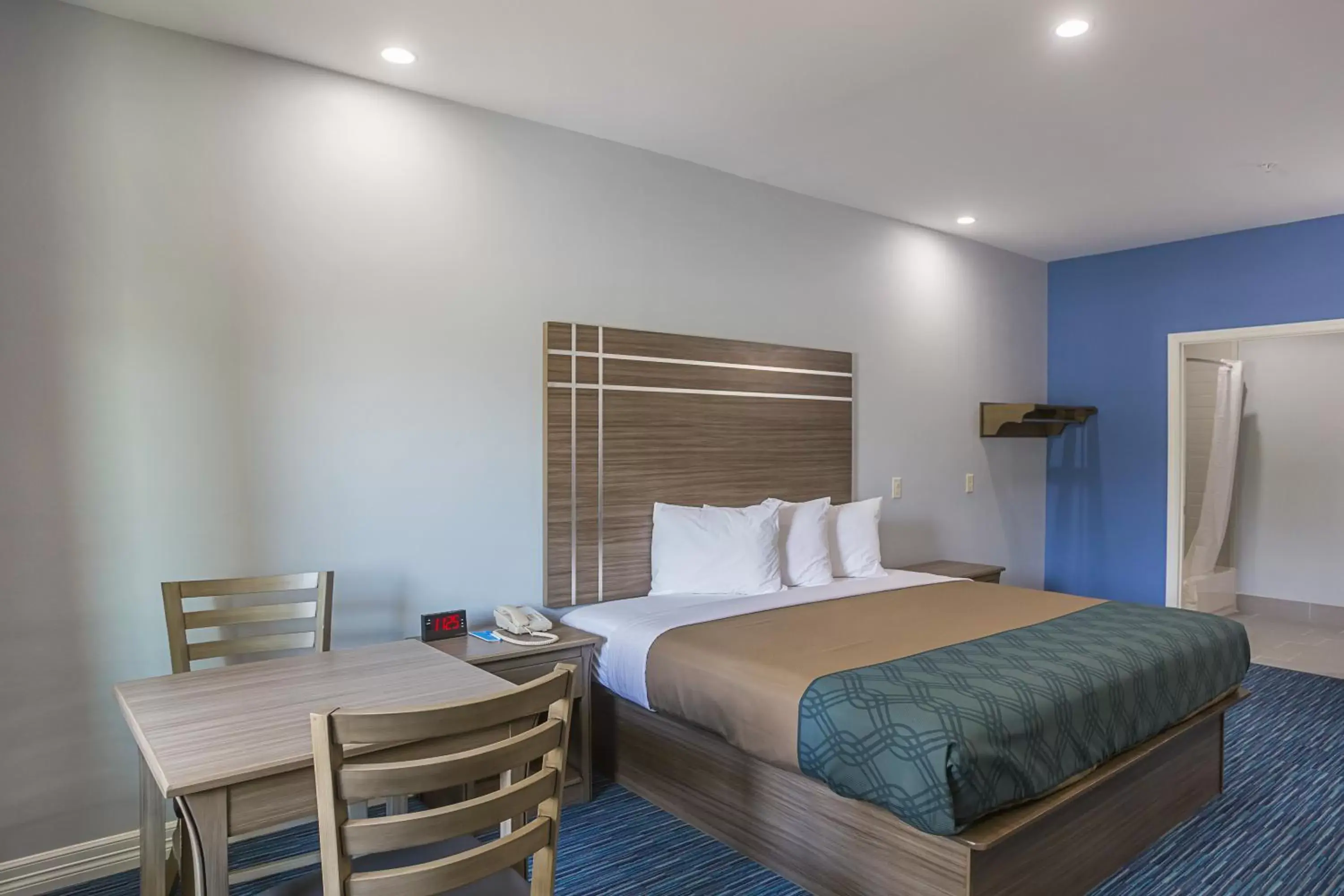 Photo of the whole room, Bed in Home Place Inn Spring I-45 North and 1960 Photo of the whole room, Bed in Home Place Inn Spring I-45 North and 1960