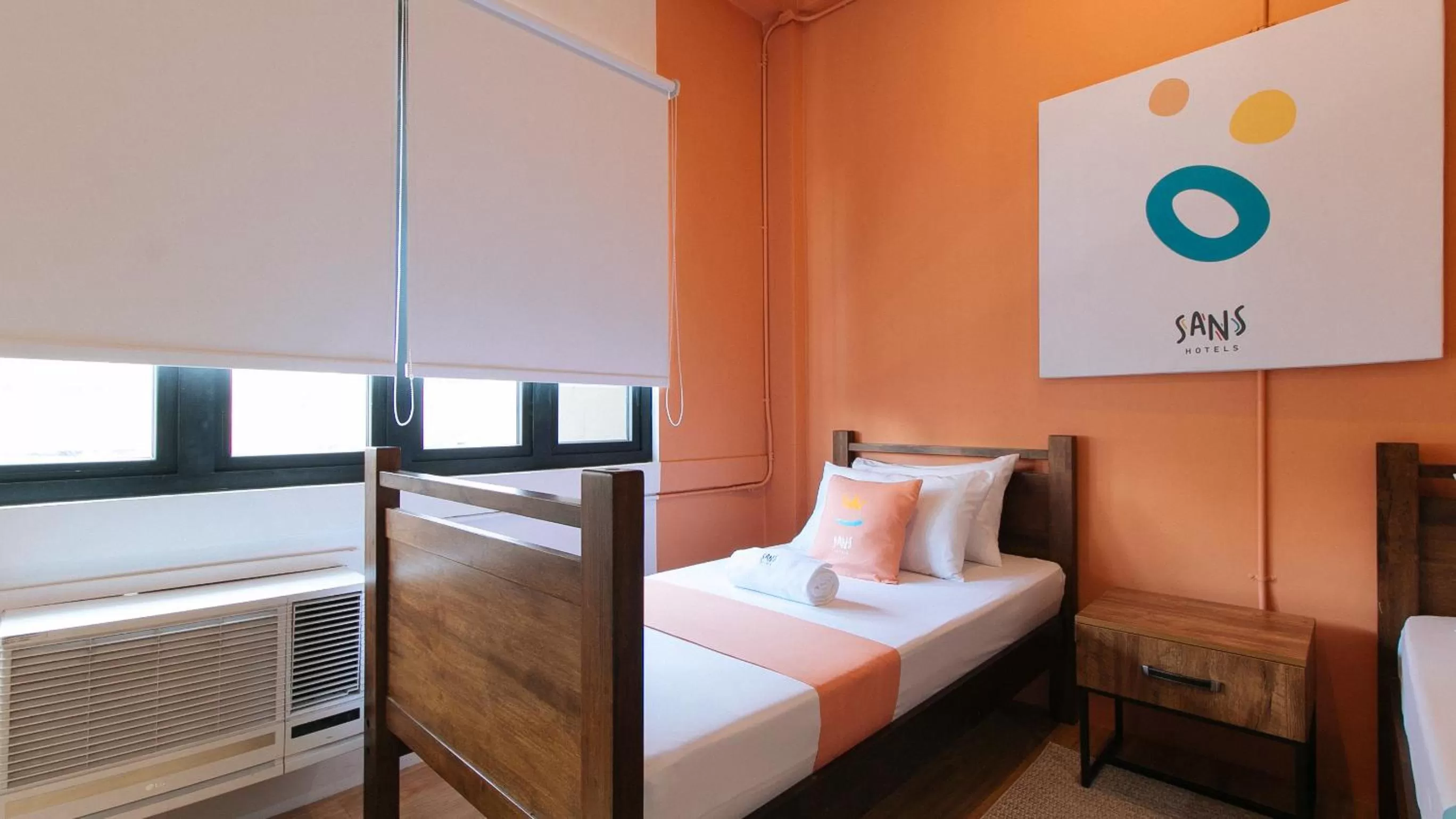 Bed in Sans Hotel Laperal Manila