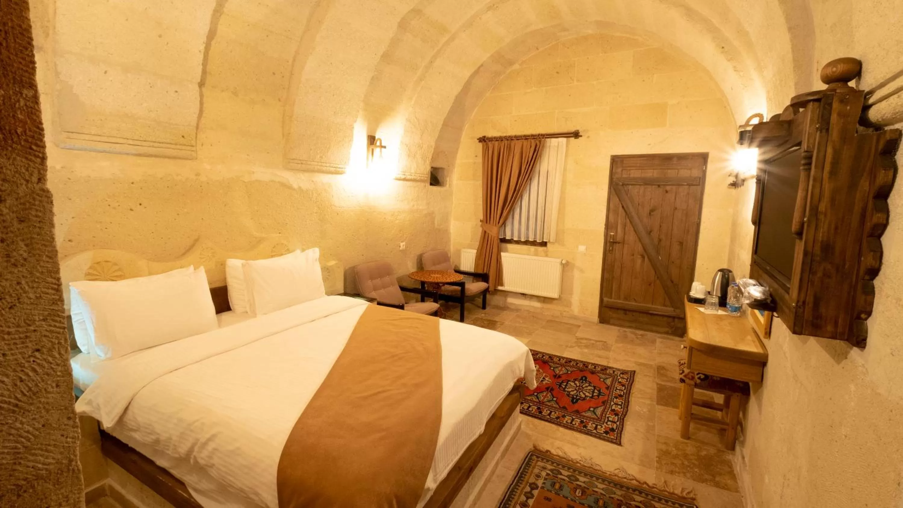 Photo of the whole room, Bed in In Stone House