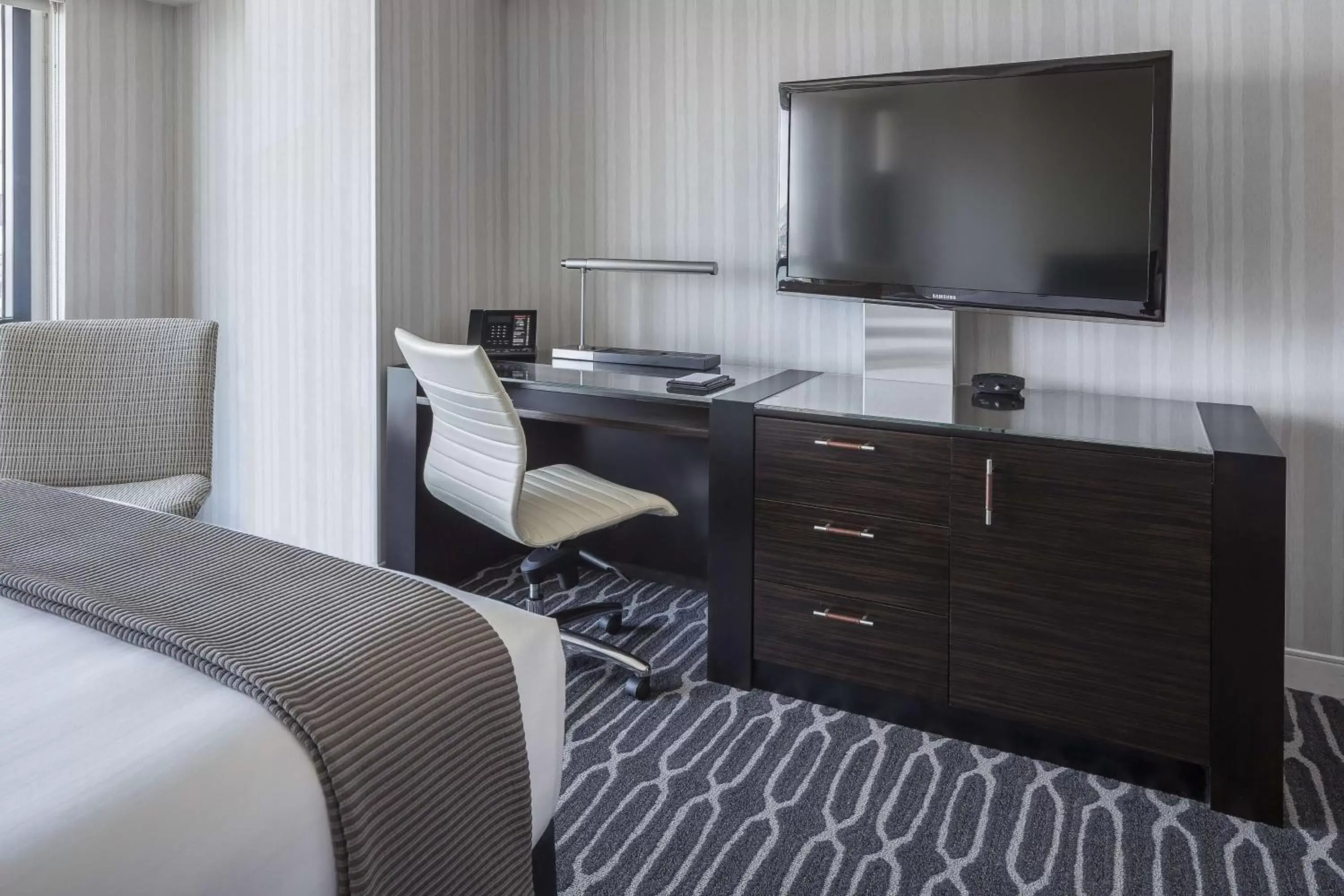 Bedroom, TV/Entertainment Center in Manchester Grand Hyatt San Diego