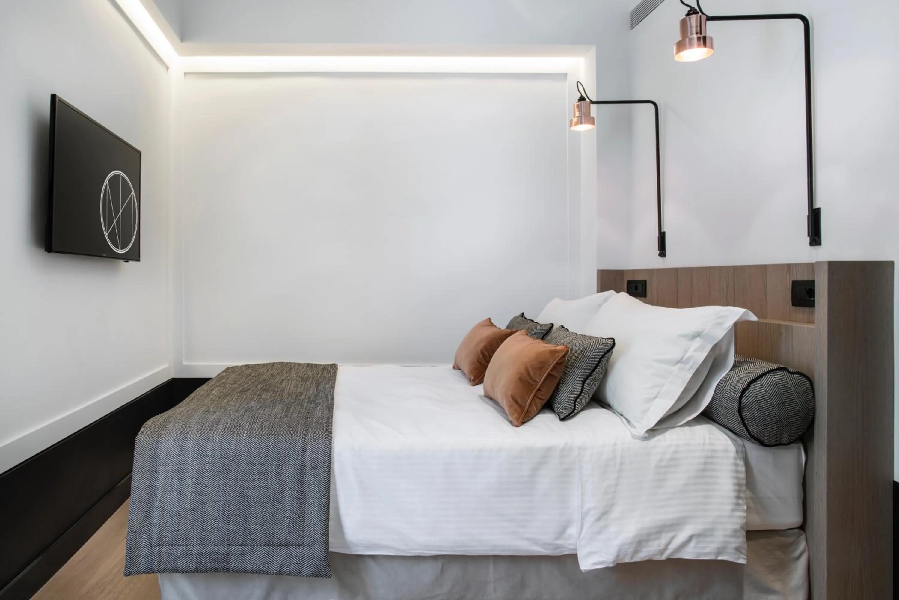 Bed in Niki Athens Hotel