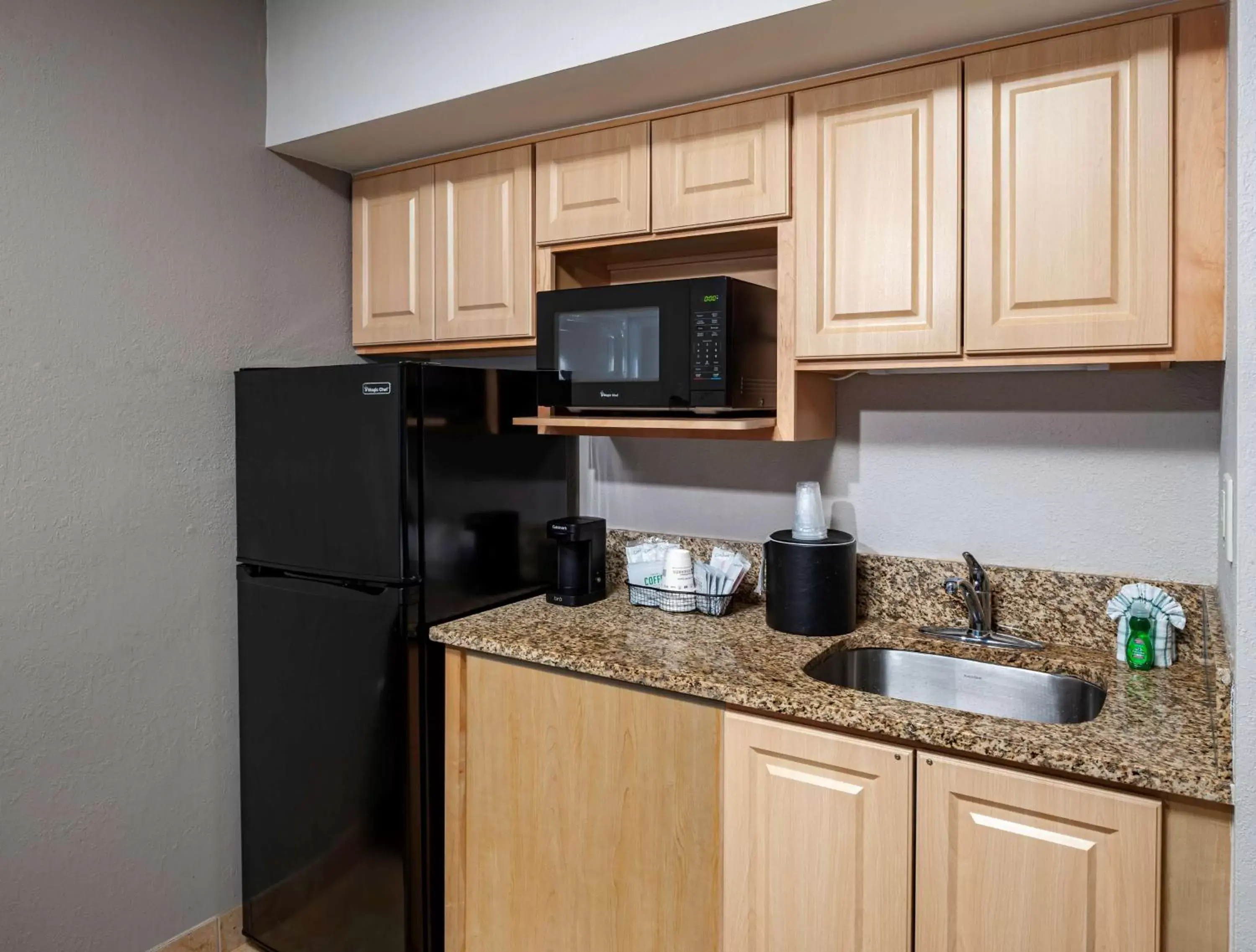 Kitchen or kitchenette, Kitchen/Kitchenette in Best Western New Smyrna Beach Hotel & Suites