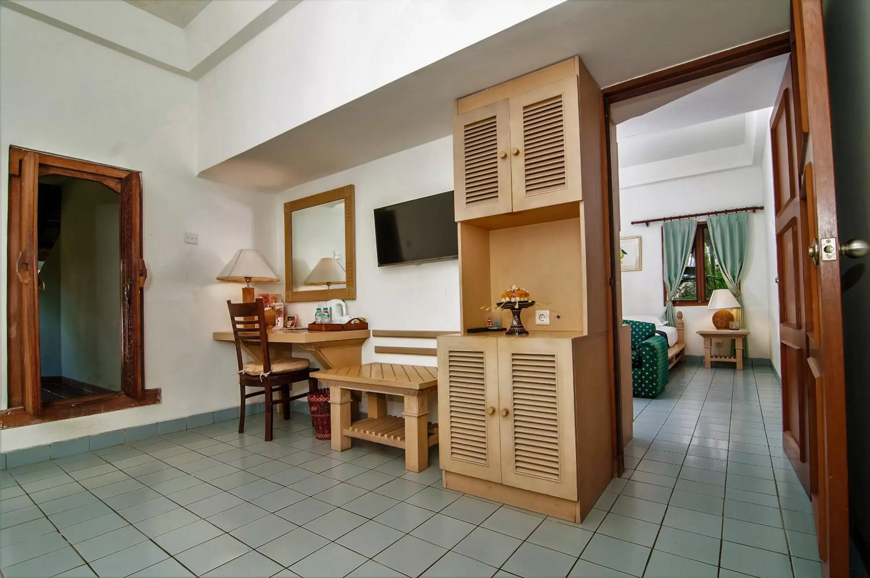 Bedroom, TV/Entertainment Center in Sativa Sanur Cottages