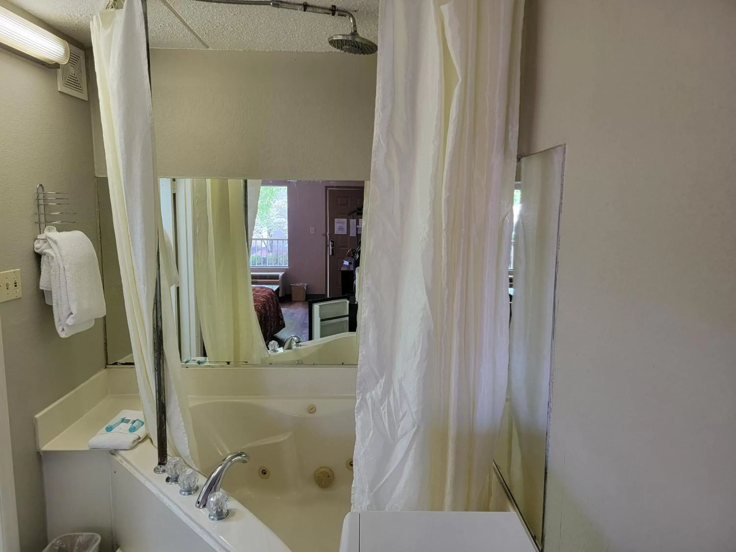 Bath, Bathroom in Studio 9 Inn & Suites