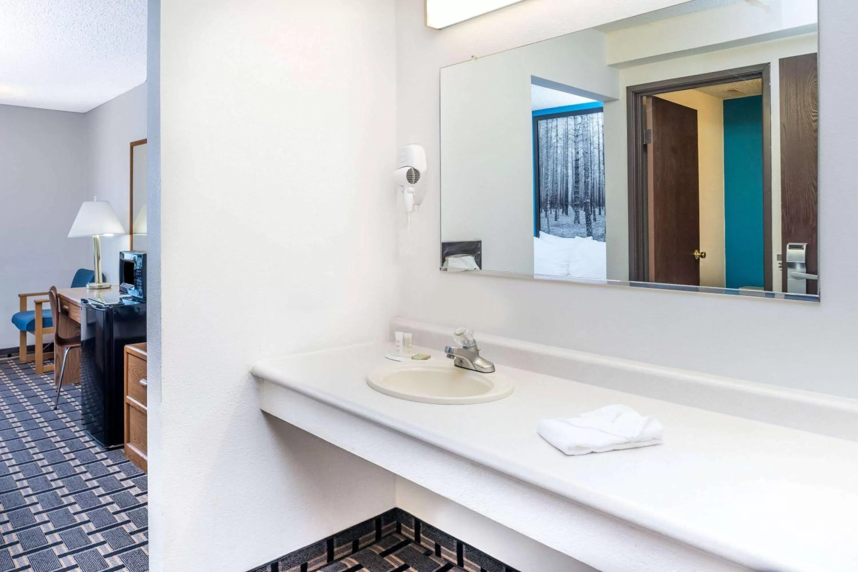 Bathroom in Super 8 by Wyndham Lincoln West