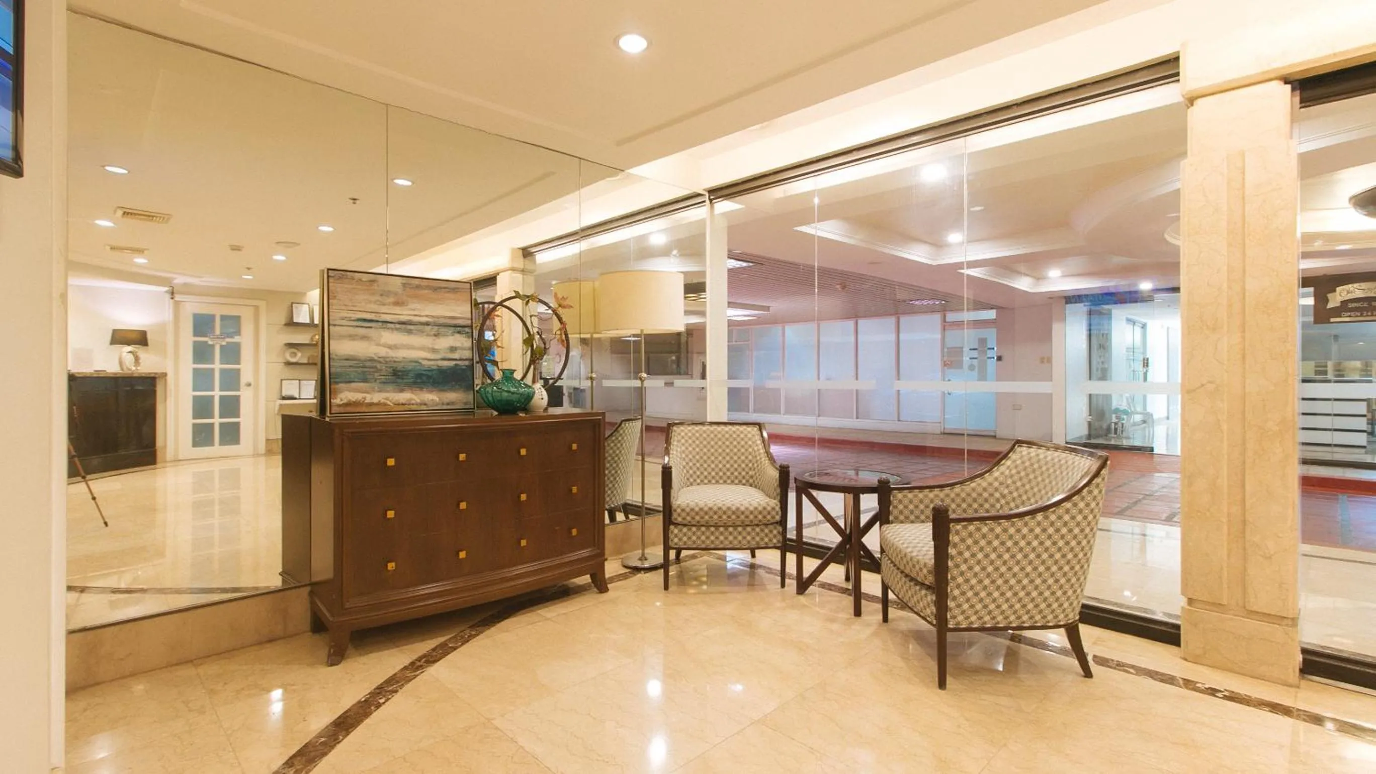 Lobby or reception in RedDoorz Premium at The Residences Olympia Makati