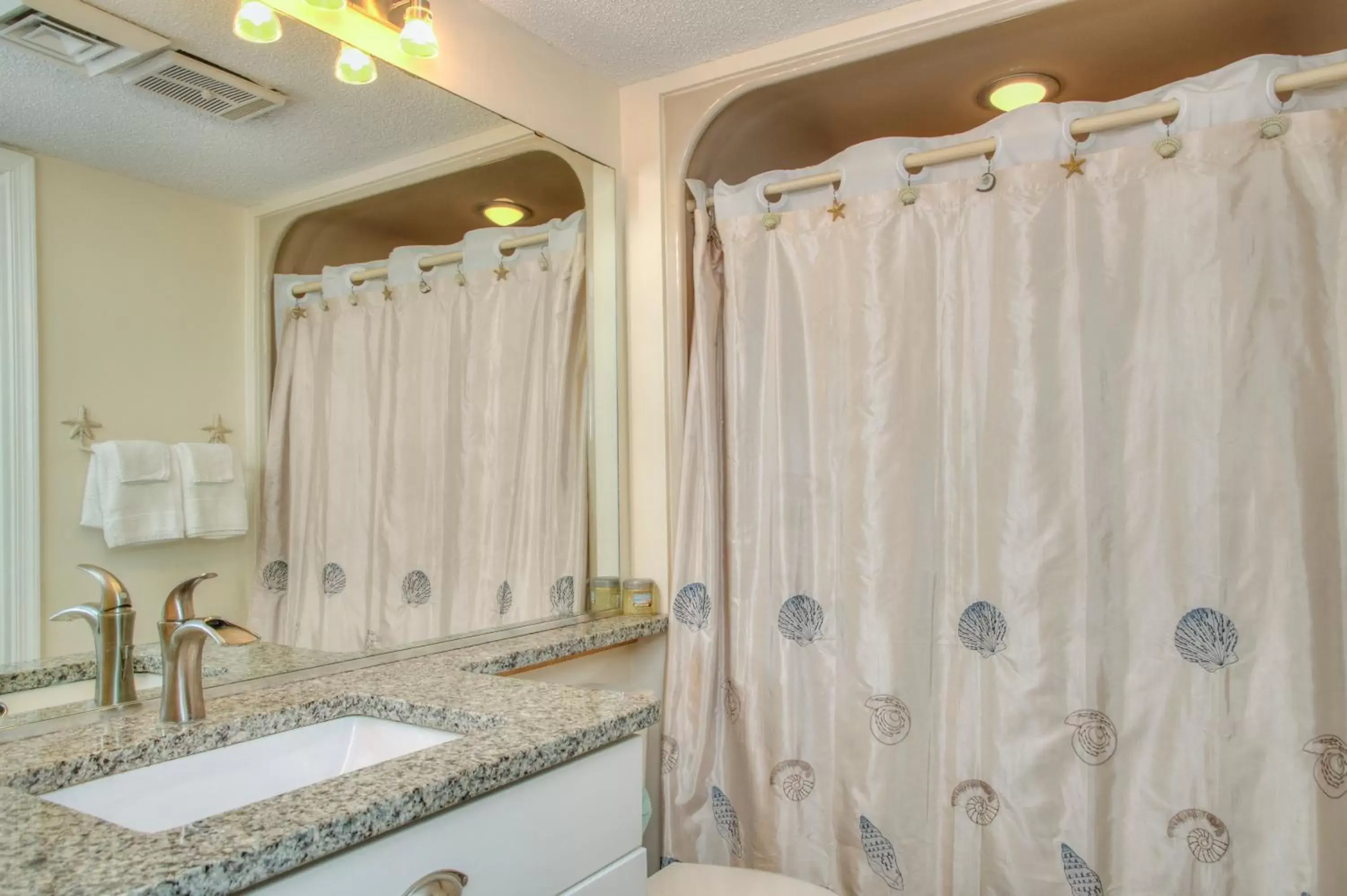 Toilet, Bathroom in Ocean Forest Plaza by Palmetto Vacations