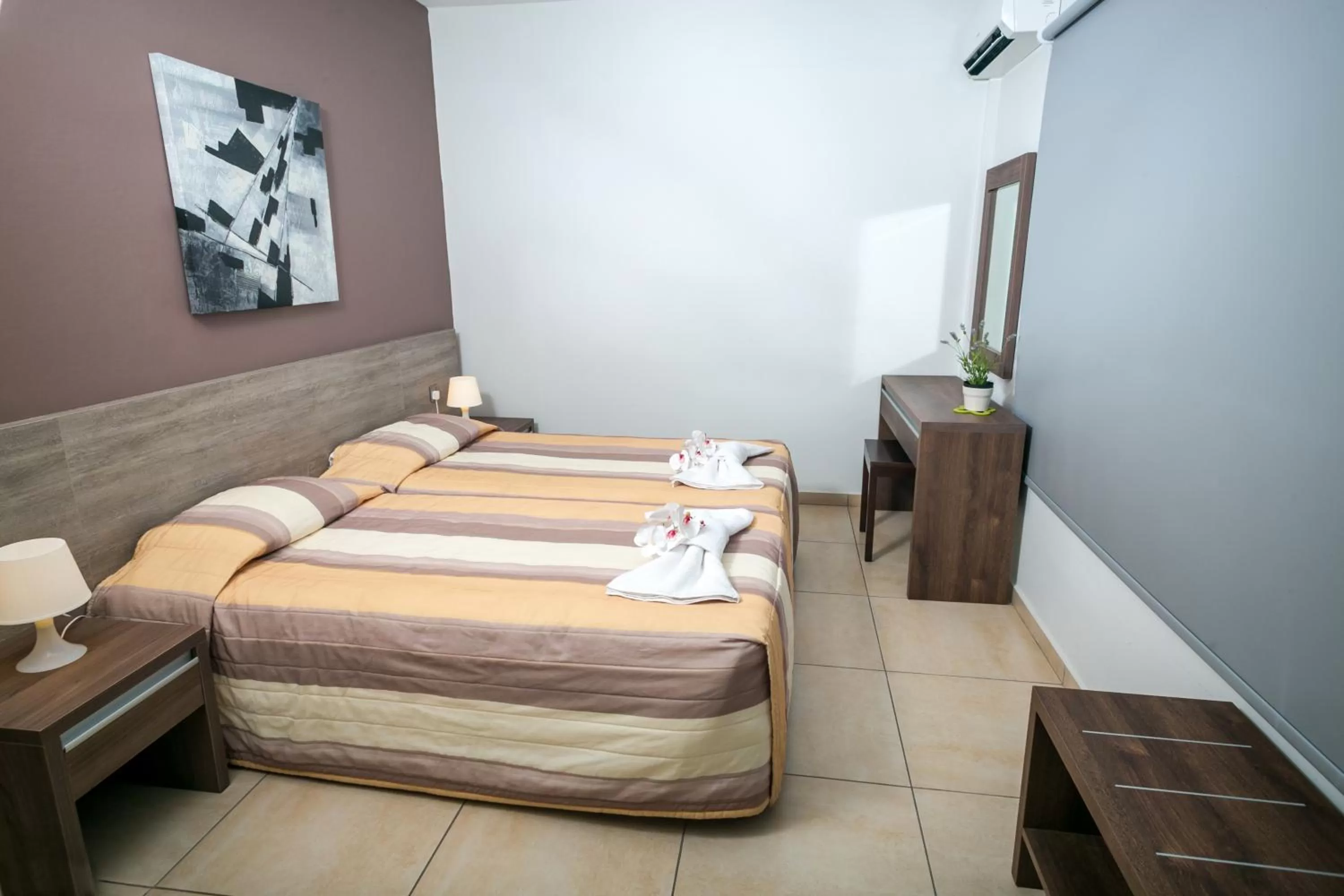 Bed in Crystallo Apartments