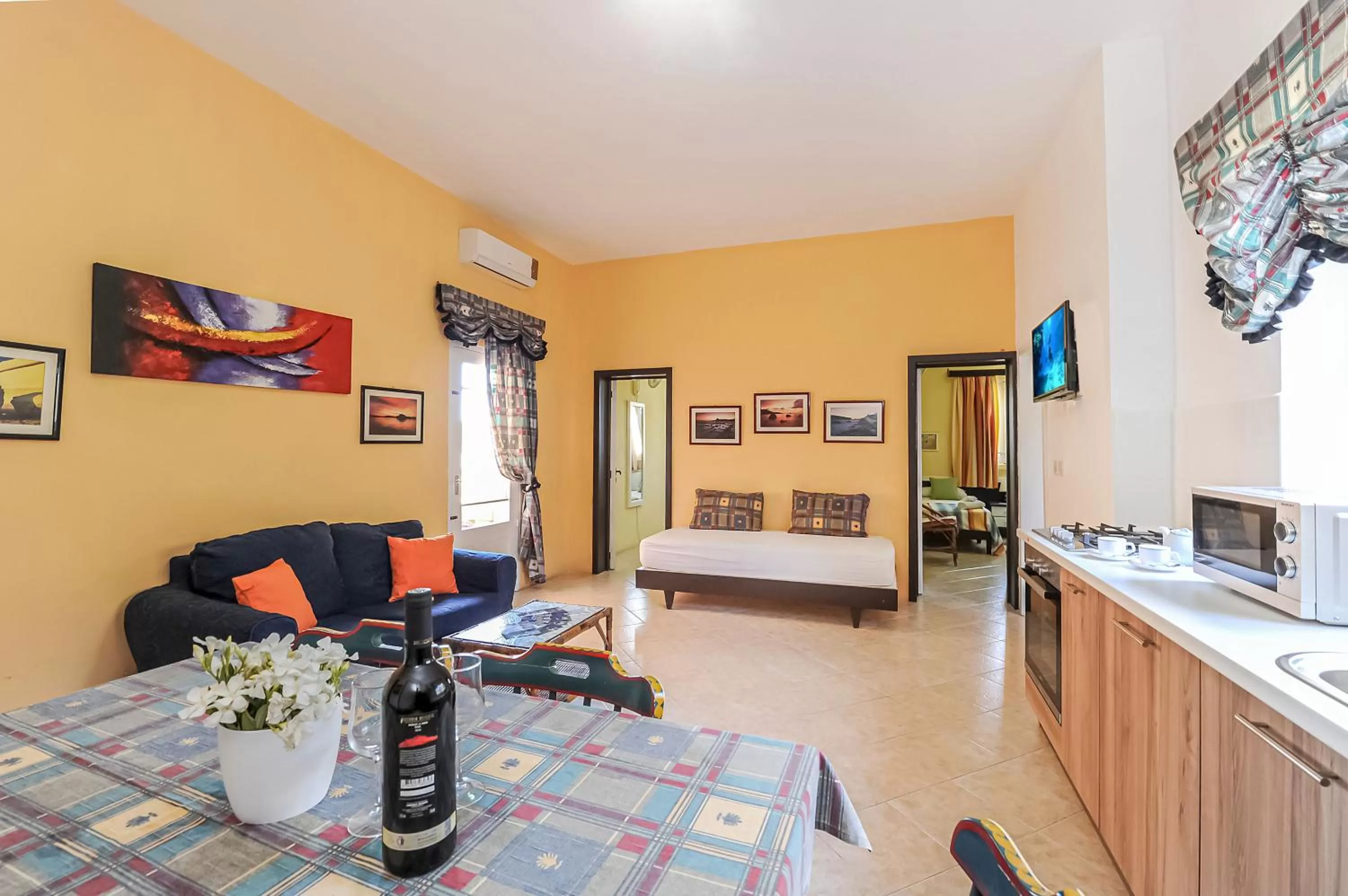 Living room, Bed in Mariblu Hotel