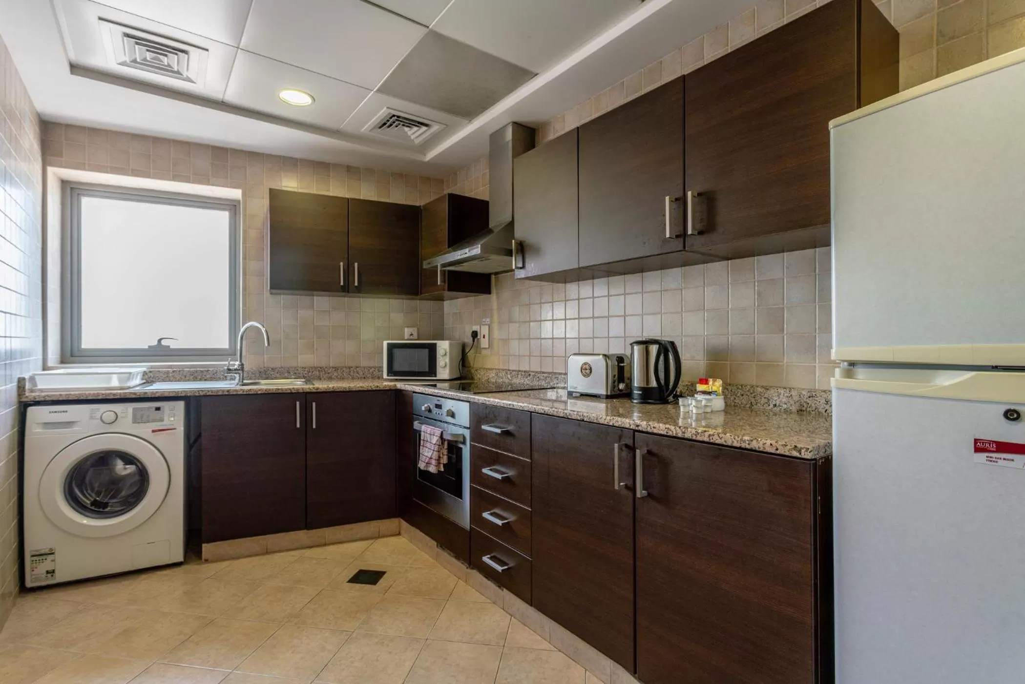 Kitchen or kitchenette in Auris Boutique Hotel Apartments, Al Barsha - At The Mall
