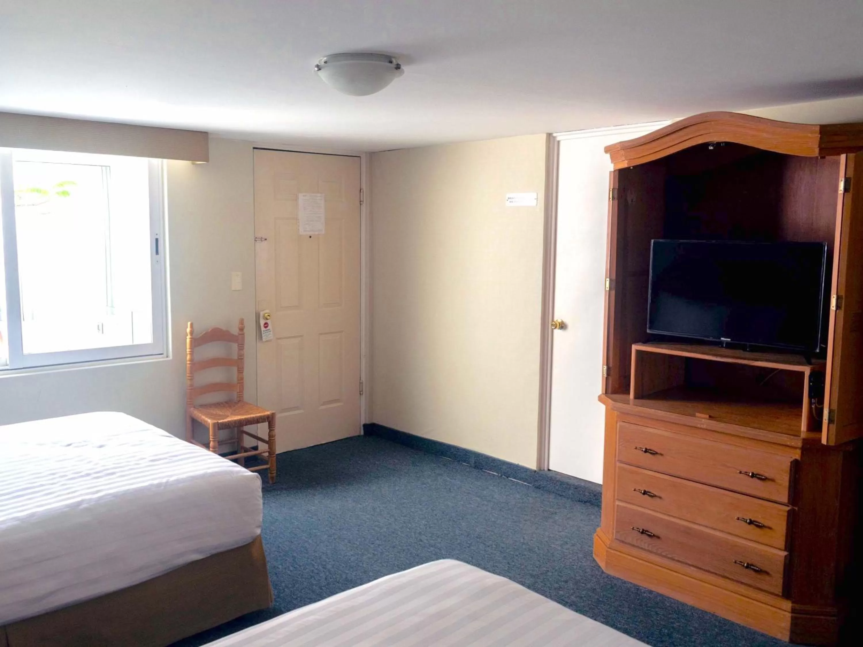 TV and multimedia, Bed in Biohotel Boutique Metepec