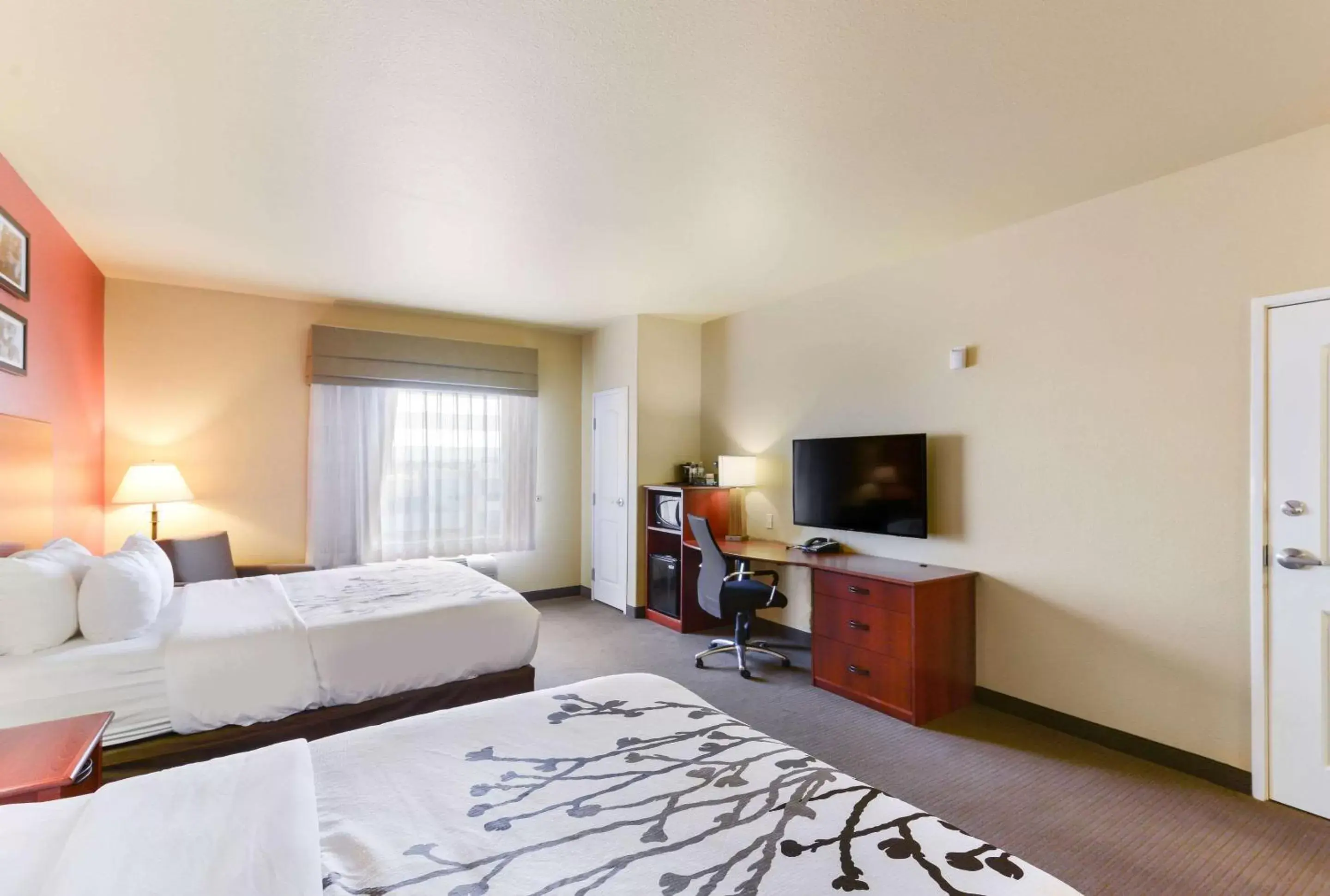 Photo of the whole room, TV/Entertainment Center in Sleep Inn & Suites Midland West