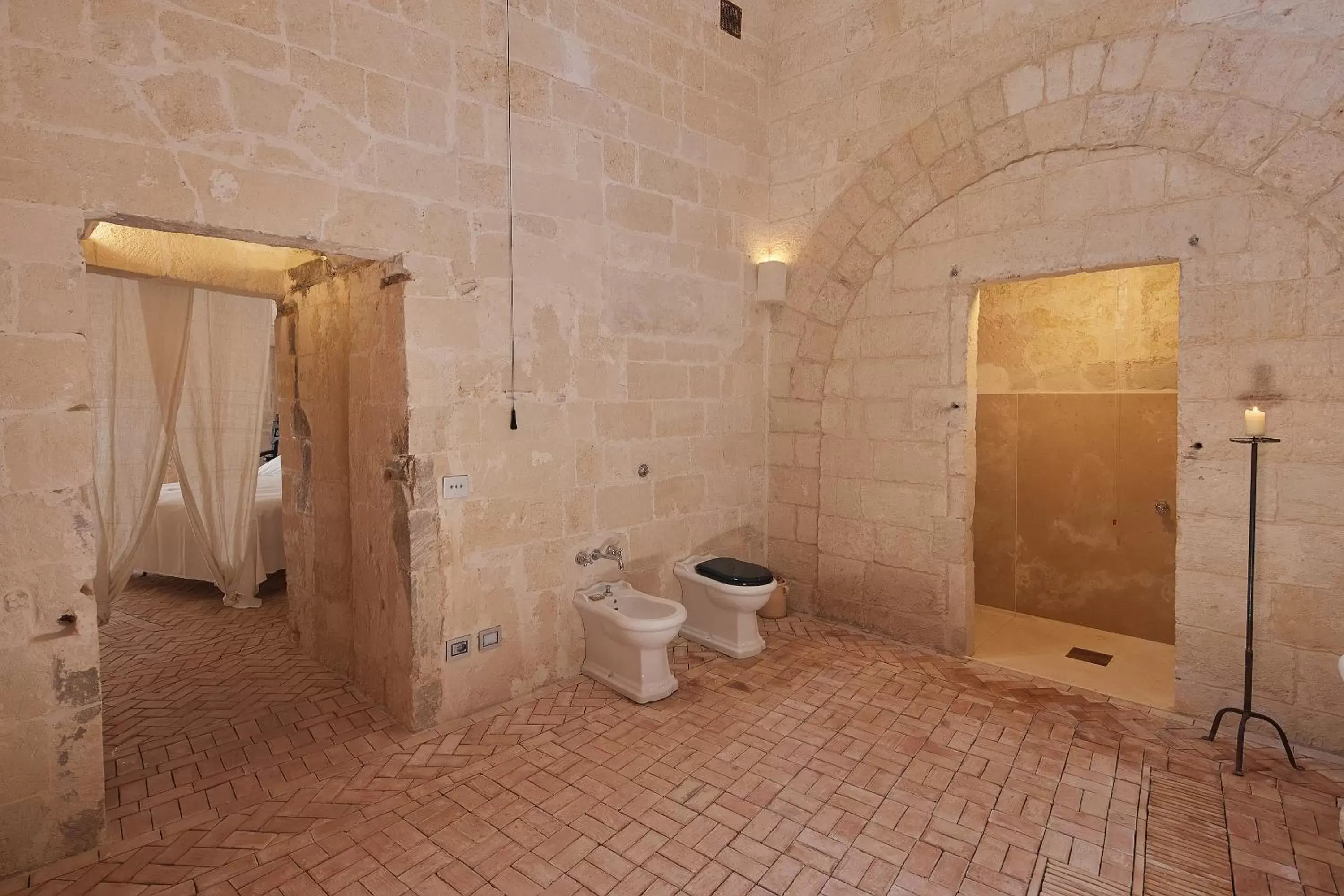 Shower, Bathroom in Sextantio Le Grotte Della Civita